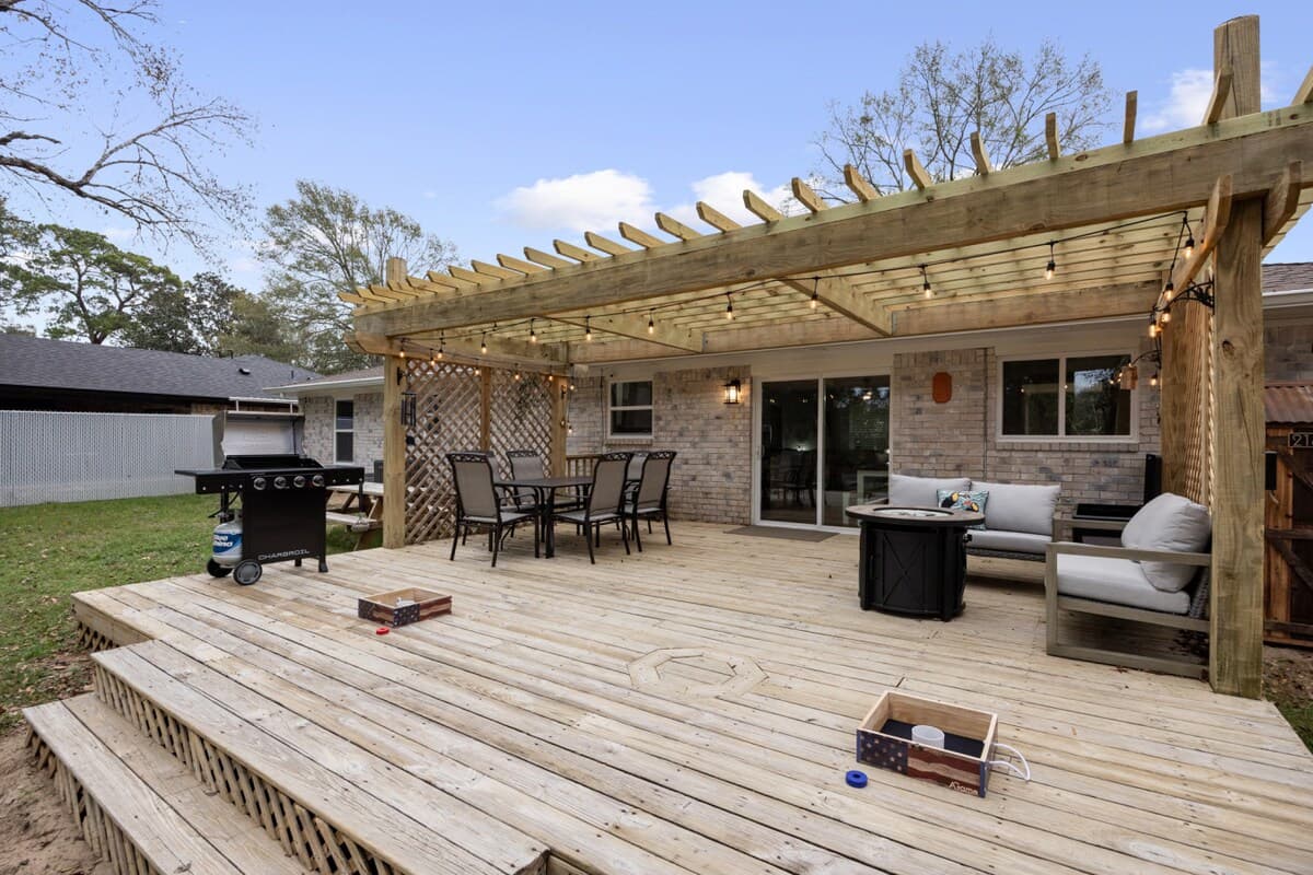 A welcoming outdoor space made for long meals, relaxed conversations, and evenings under the lights.
