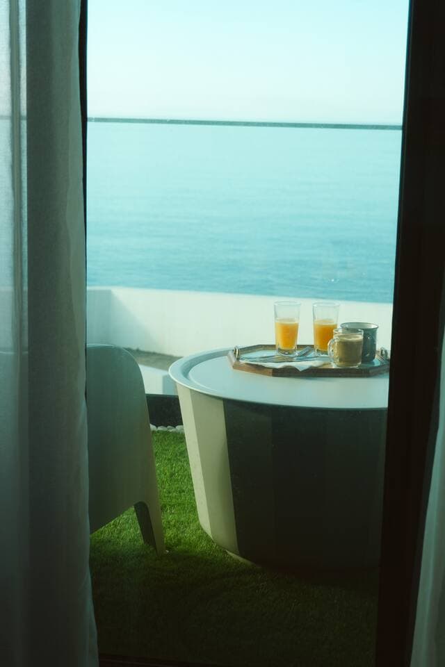 V -  Breakfast in the balcony