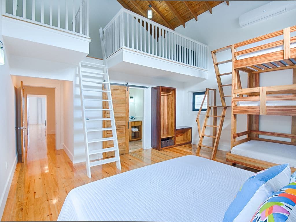 🌿 Our custom lofted bunk room offers a stylish, airy retreat. With sturdy construction and premium comfort, these "treehouse-style" beds provide a fun yet sophisticated sleeping space for guests of all ages. 😴
