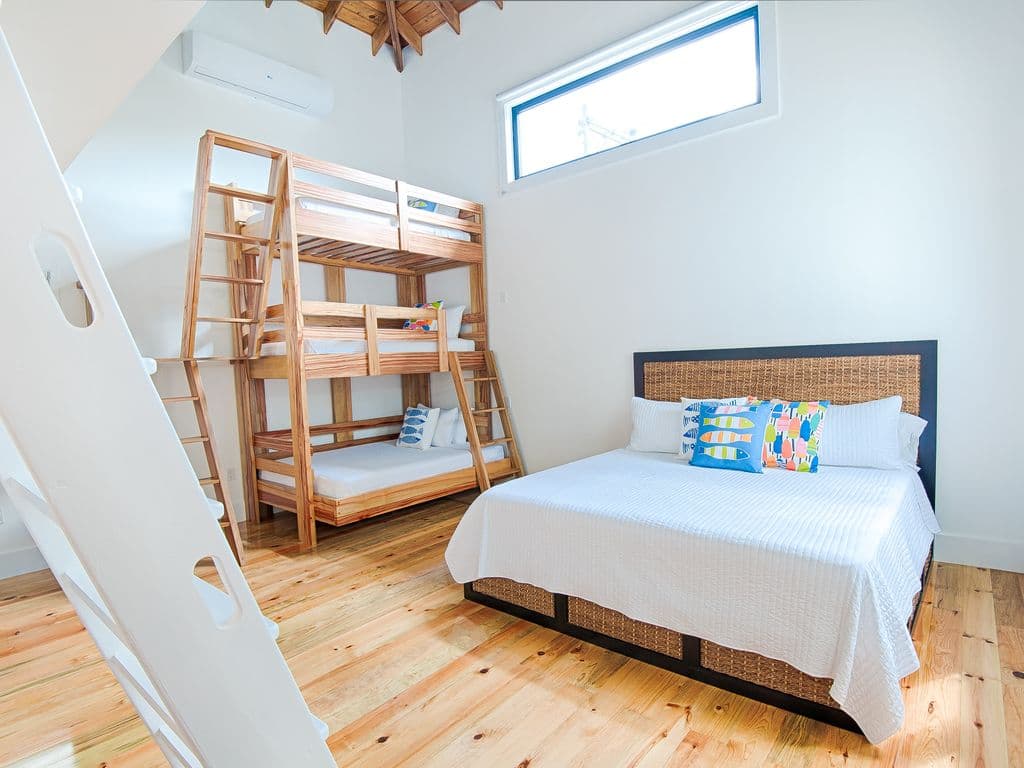 🌿 Our custom lofted bunk room offers a stylish, airy retreat. With sturdy construction and premium comfort, these "treehouse-style" beds provide a fun yet sophisticated sleeping space for guests of all ages. 😴