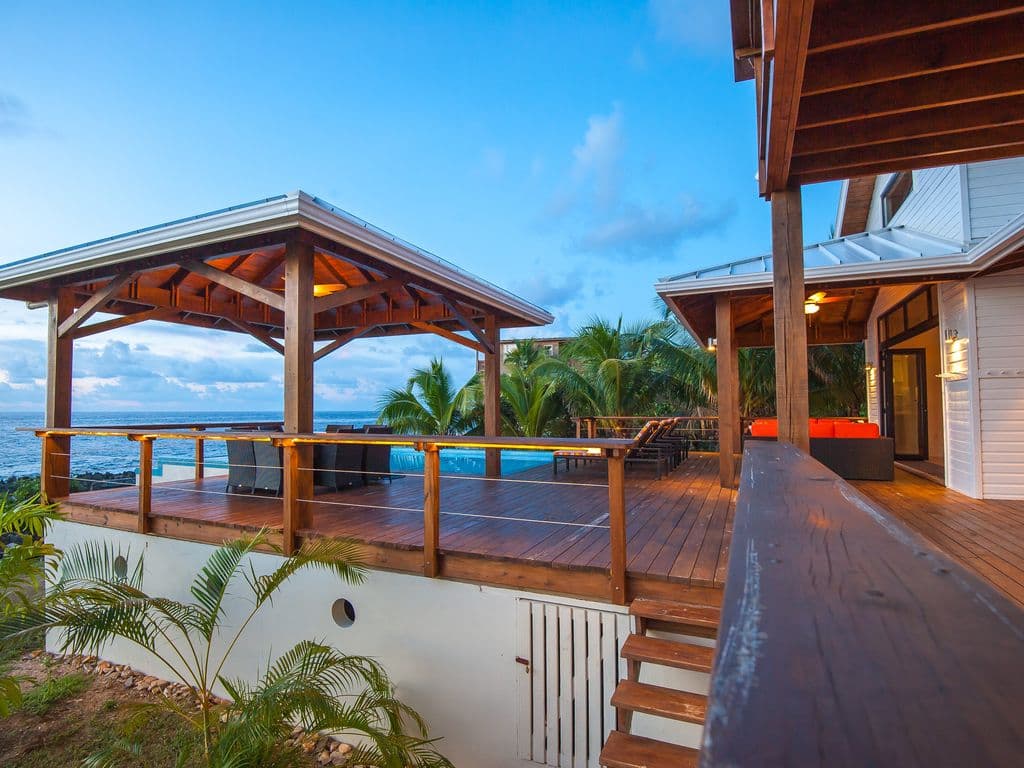 🌿 Watch the Caribbean sky catch fire from the Vivaro South deck. Our infinity pool reflects the golden sunset, creating a breathtaking backdrop for evening drinks and total relaxation. The ultimate golden hour experience. 🌅🥂