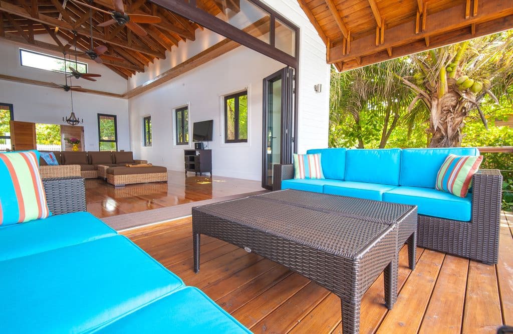 Our expansive deck features deep covered areas, providing a cool retreat from the tropical sun. Enjoy the outdoors all day long with plenty of shaded seating and dining spaces that capture the breeze while keeping you perfectly comfortable and protected. 