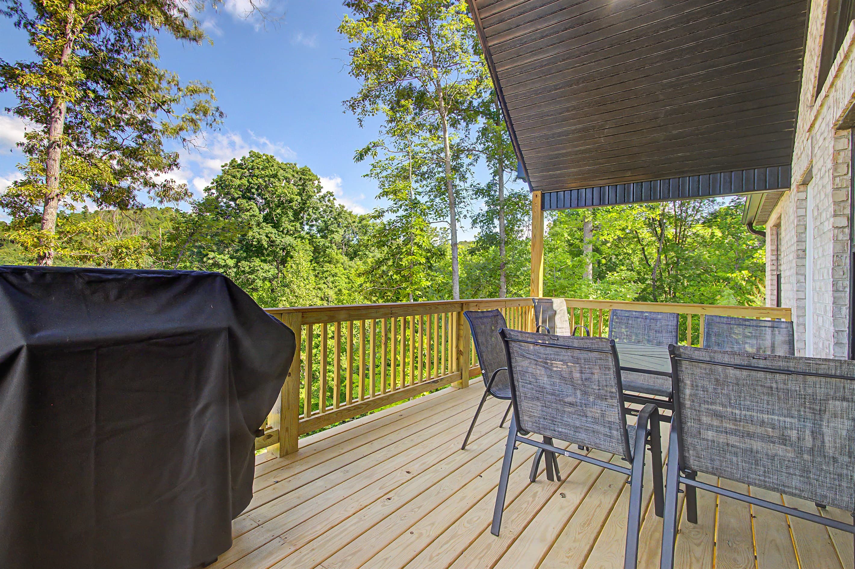Main level deck. Dining and grill