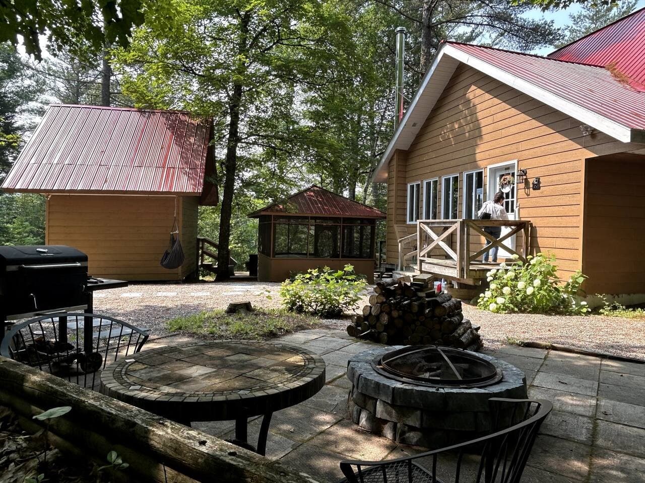 fire pit, seating area and charcoal barbecue. Make sure to bring your own coals!