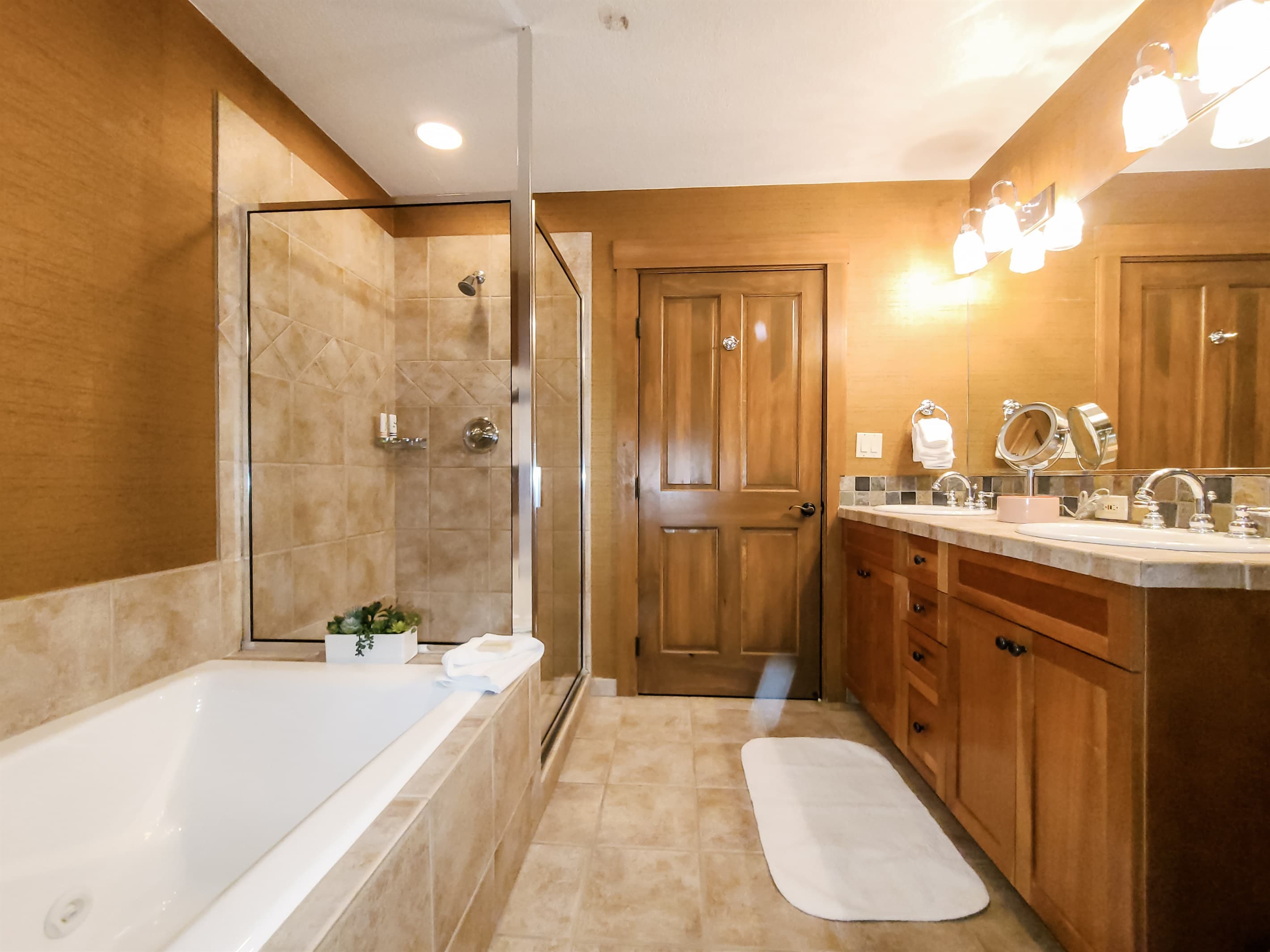 Jetted tub with separate shower