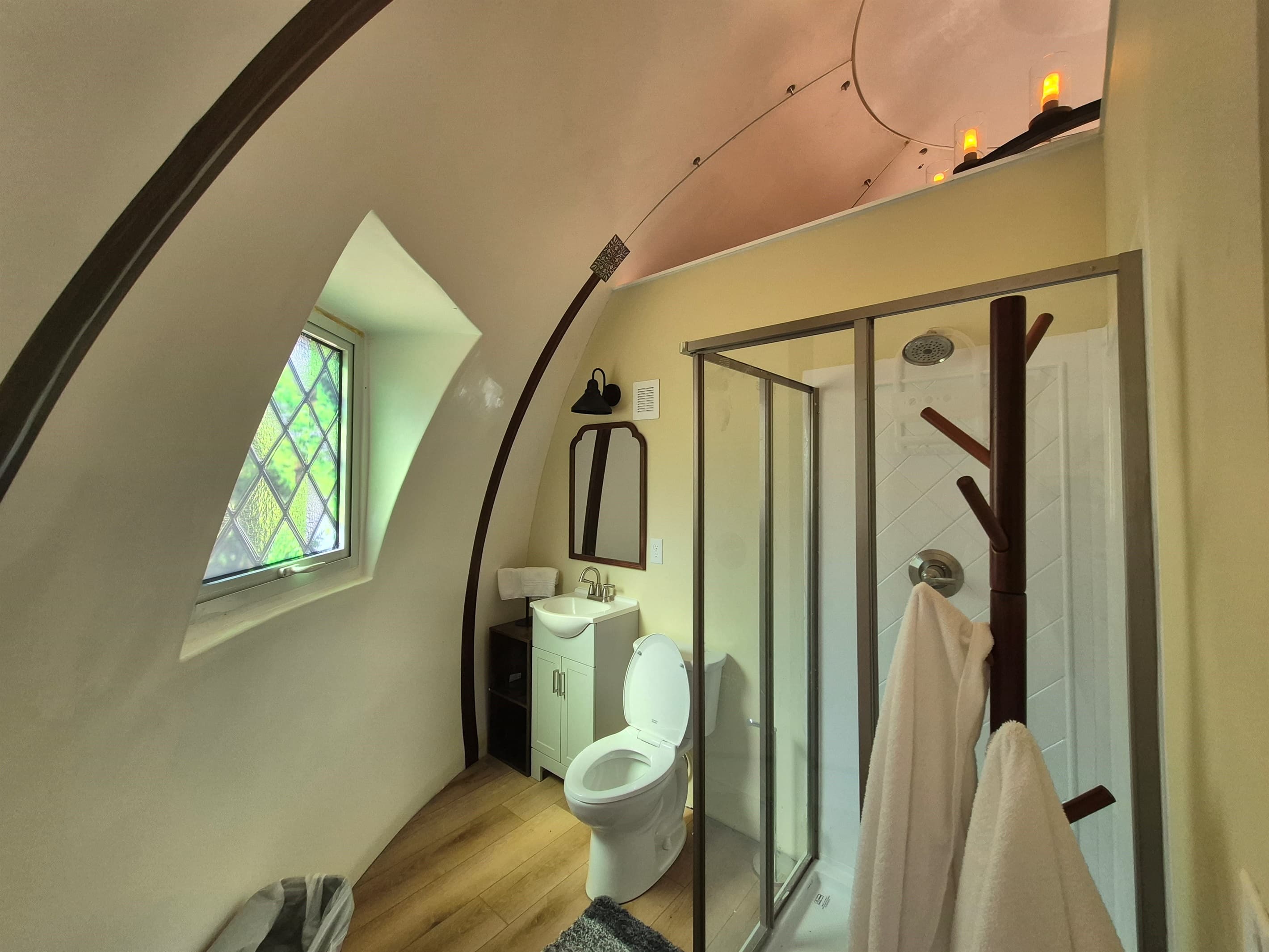 Standard bathroom with normal toilet and standard size shower