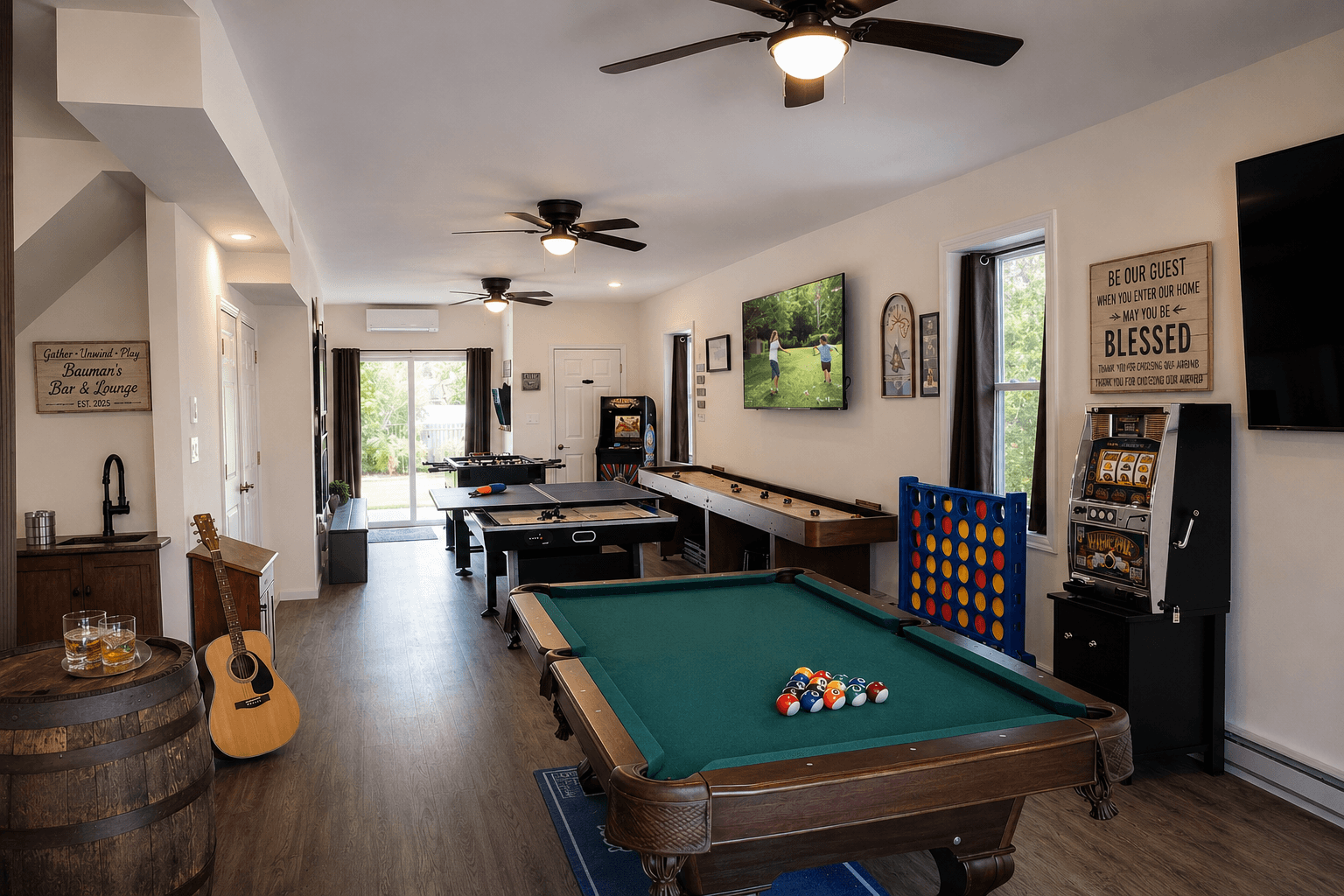 Game room with mini bar, pool table, shuffleboard, air hockey, ping pong, connect 4, slot machine, 2