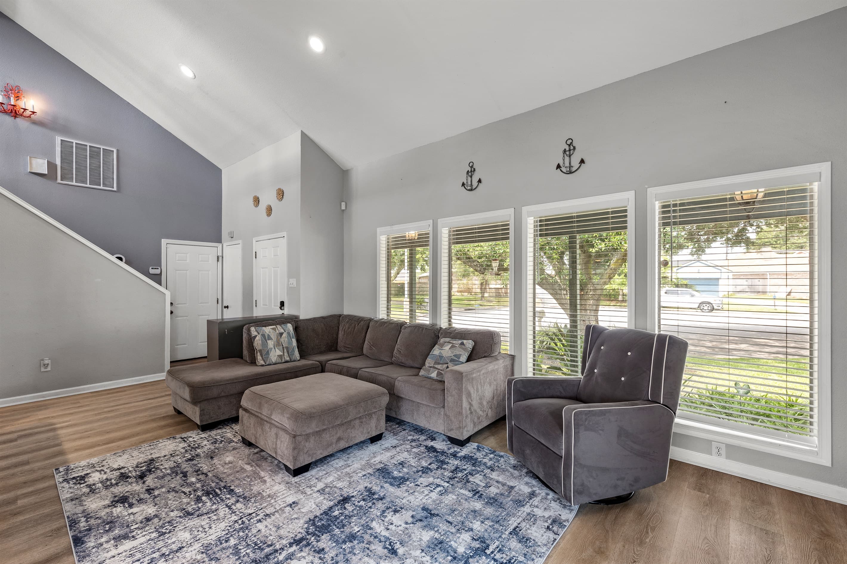Natural light fills the living room at Lakeview Landing — bright, welcoming, and designed for groups up to 10 guests.
