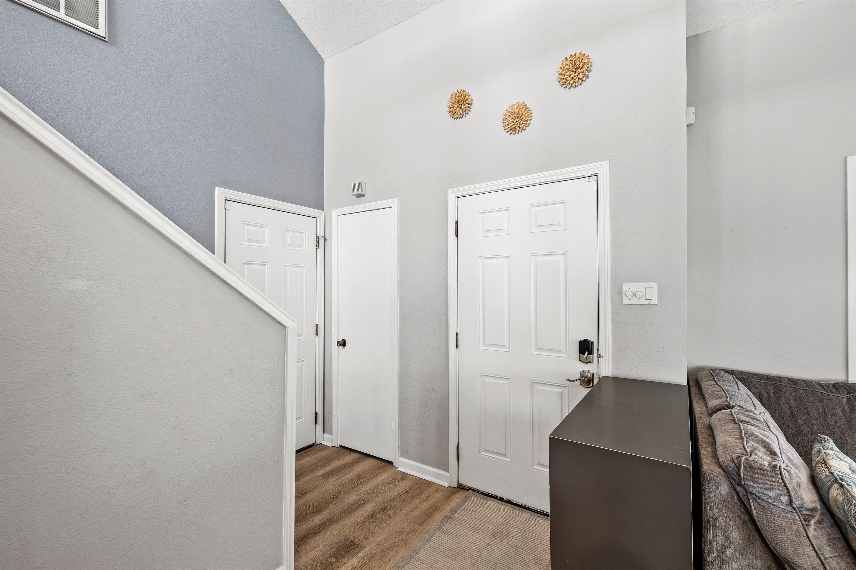 Open staircase at Lakeview Landing — the multi-level layout gives every guest their own space and privacy throughout the home.