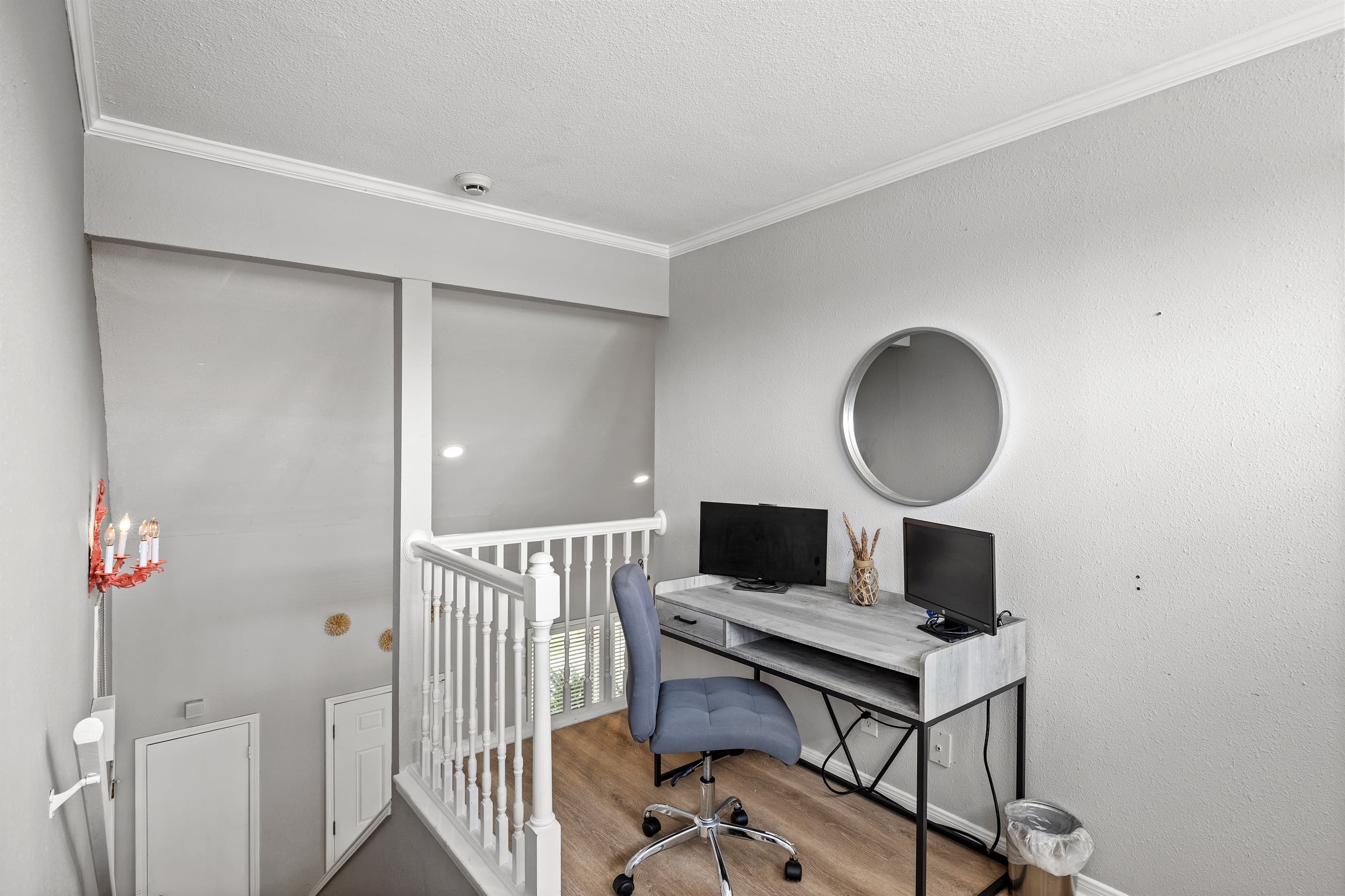 Upstairs office at Lakeview Landing — dedicated workspace at the top of the stairs, perfect for remote workers or planning your Galveston itinerary.