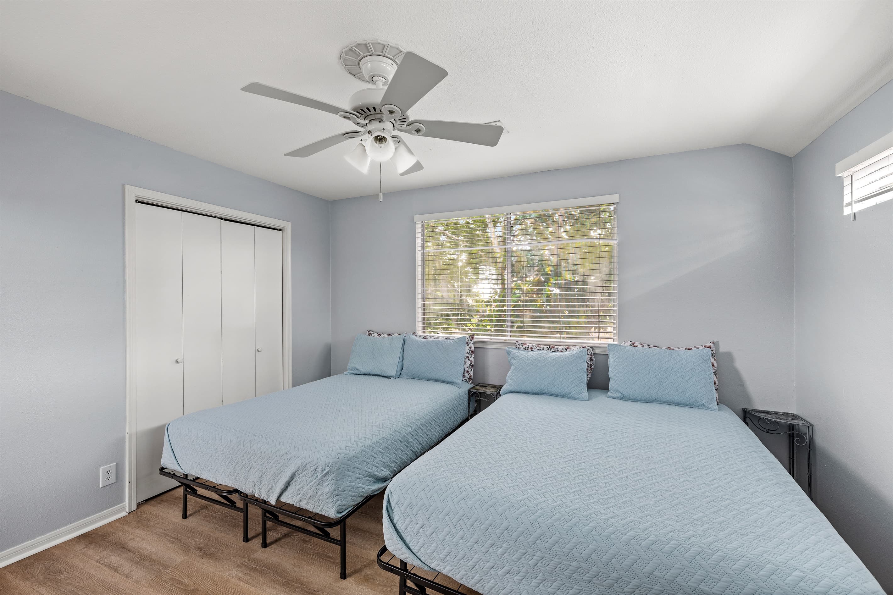 Bedroom 3 at Lakeview Landing — comfortably sleeps multiple guests, part of why this Galveston waterfront home accommodates up to 10.
