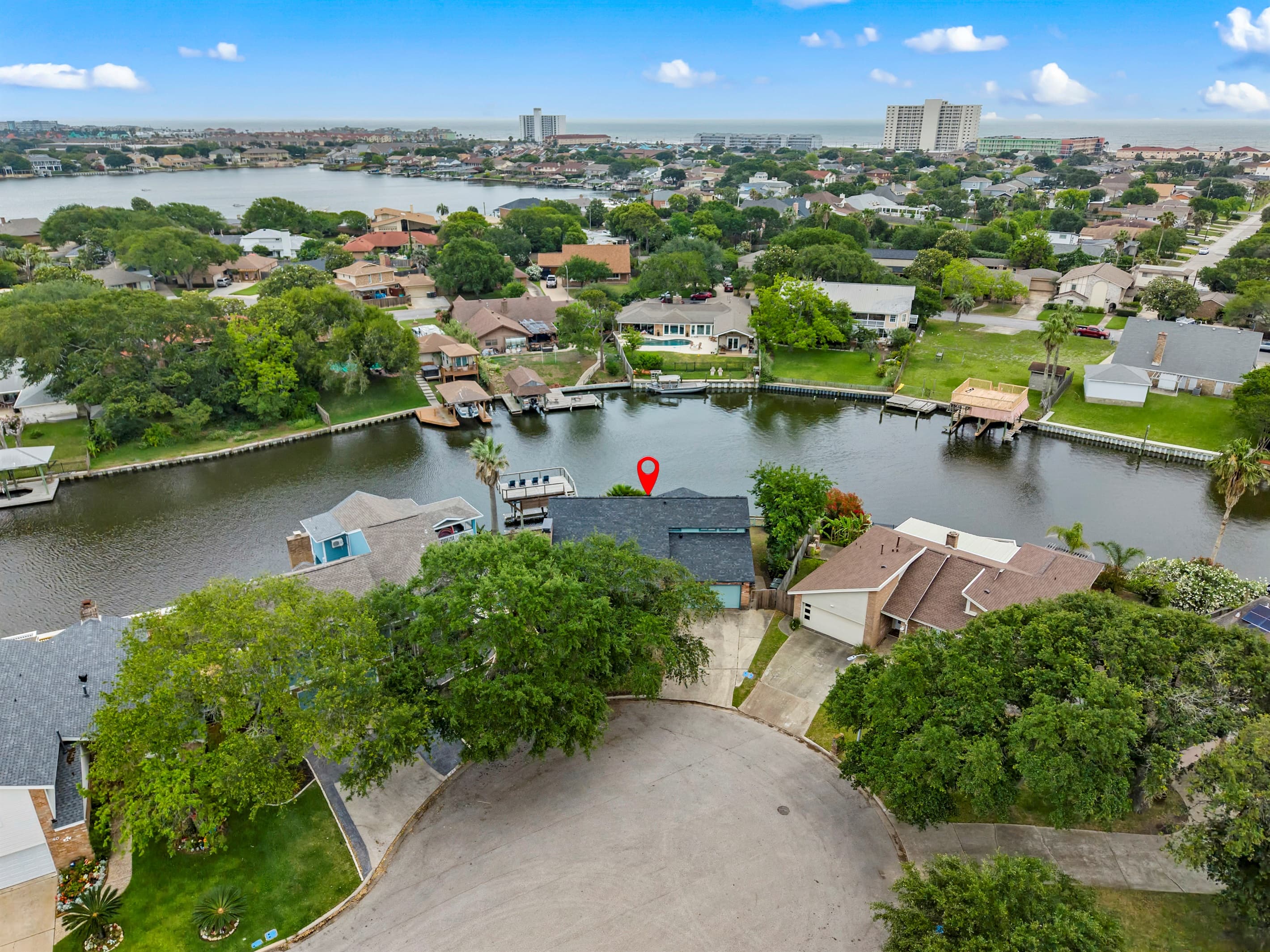 Aerial view of Lakeview Landing on Madeline Lake — the red pin marks your waterfront home, surrounded by tranquil Galveston waterways.