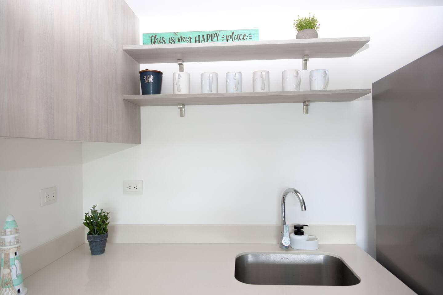 A convenient dishwashing sink makes cleaning up quick and easy.