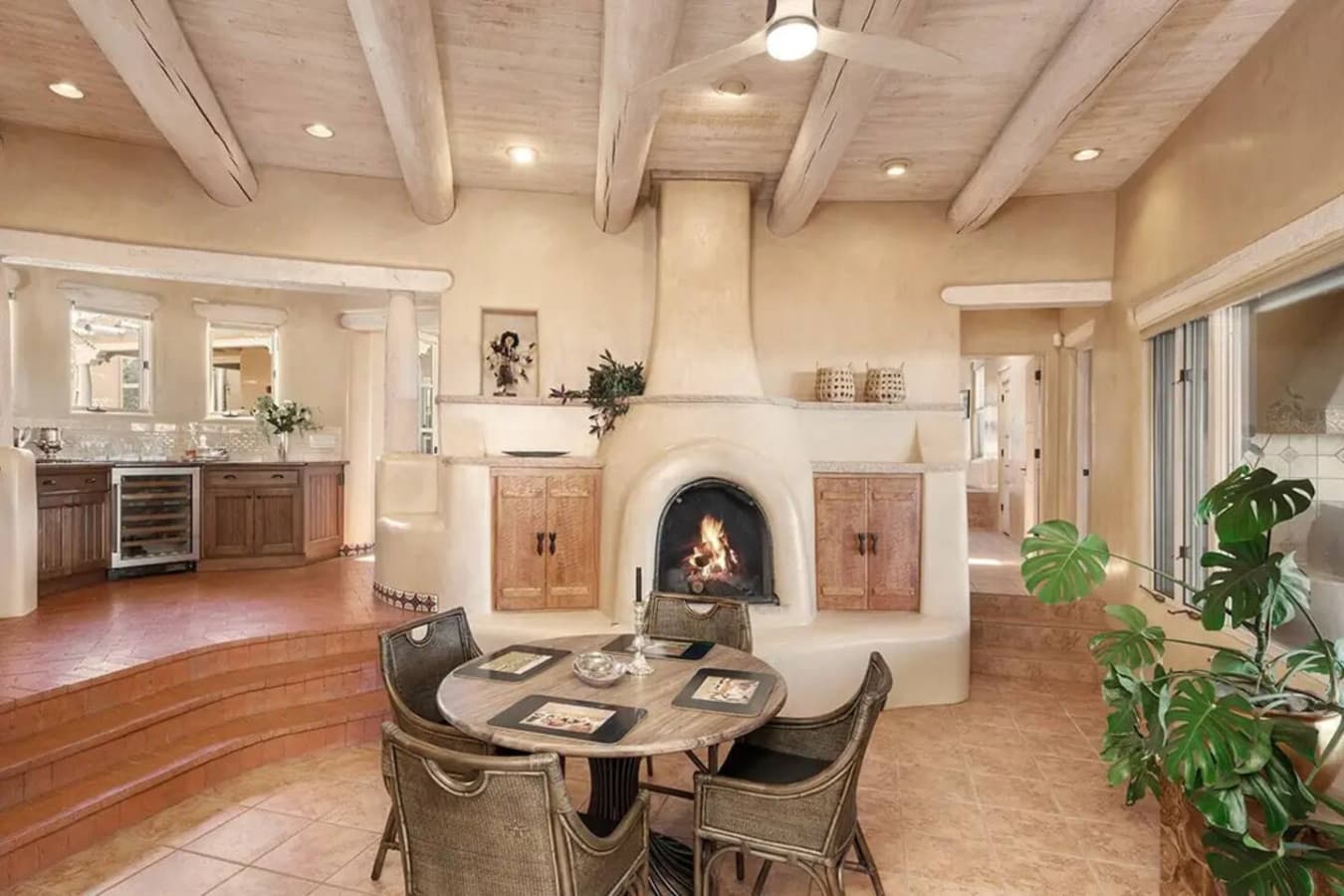 In Kitchen Dining with Kiva Wood Burning Fireplace