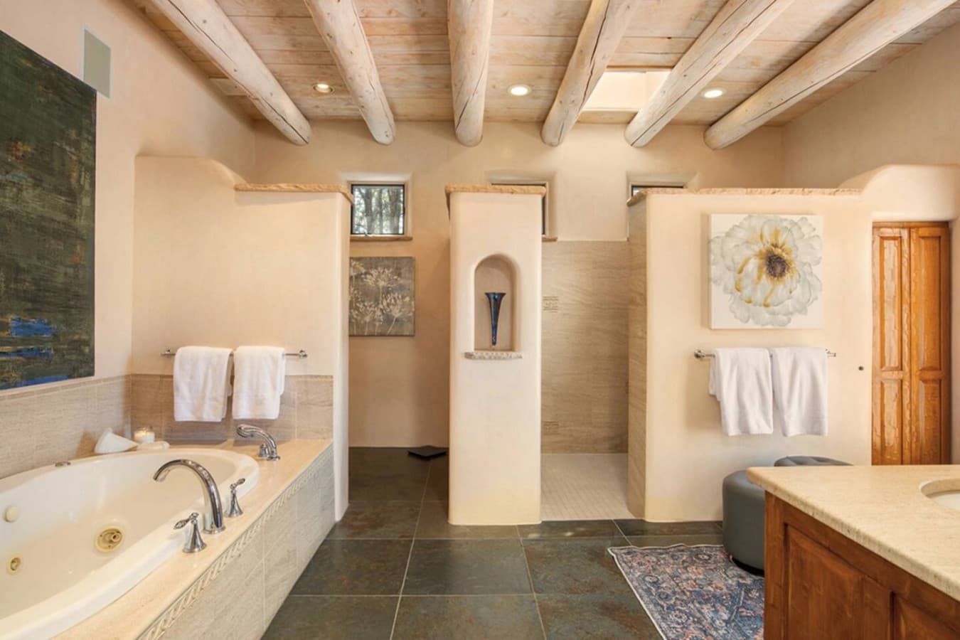 Master Bathroom with Walk In Shower with Dual Shower heads and Private Toilet area
