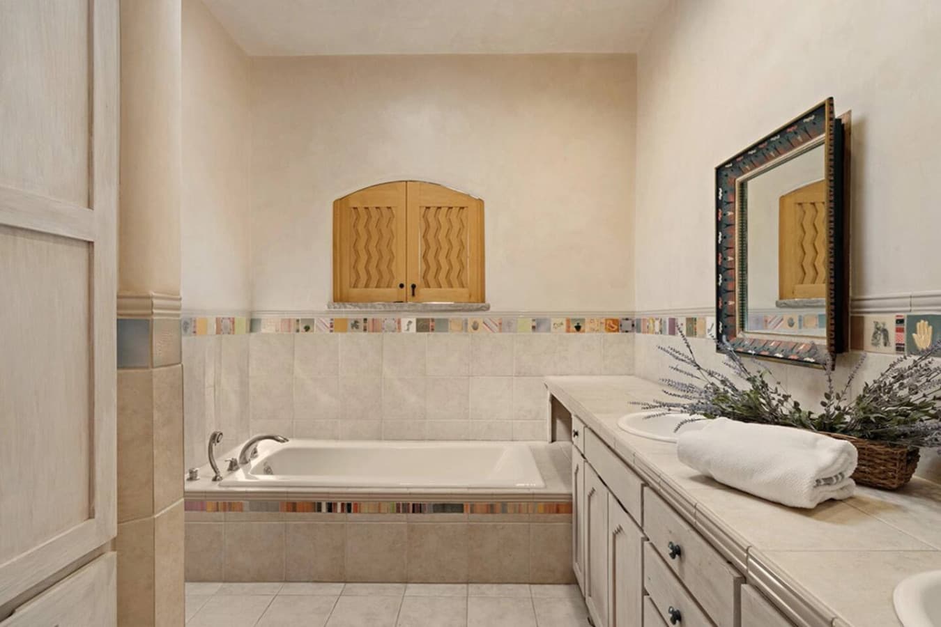 Full Bathroom with Walk In Shower- off Private Office with Queen Size Hide a bed.