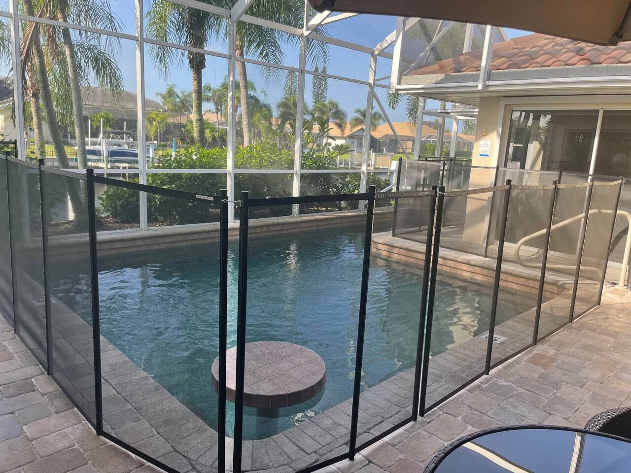 Portable Child Safety Fence.  This fence is stored in a plastic box in the garage labelled as Pool Safety Fence.  You may install this easily if you have young children at risk of falling into the pool.