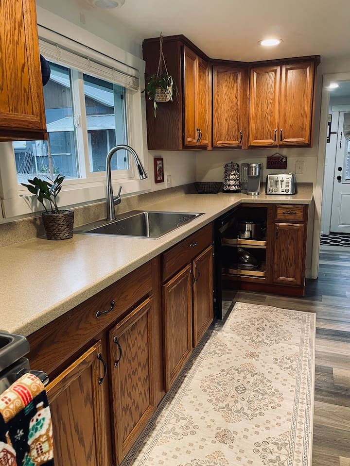A bright, welcoming kitchen where form meets function, ready for cooking, gathering, and shared moments.