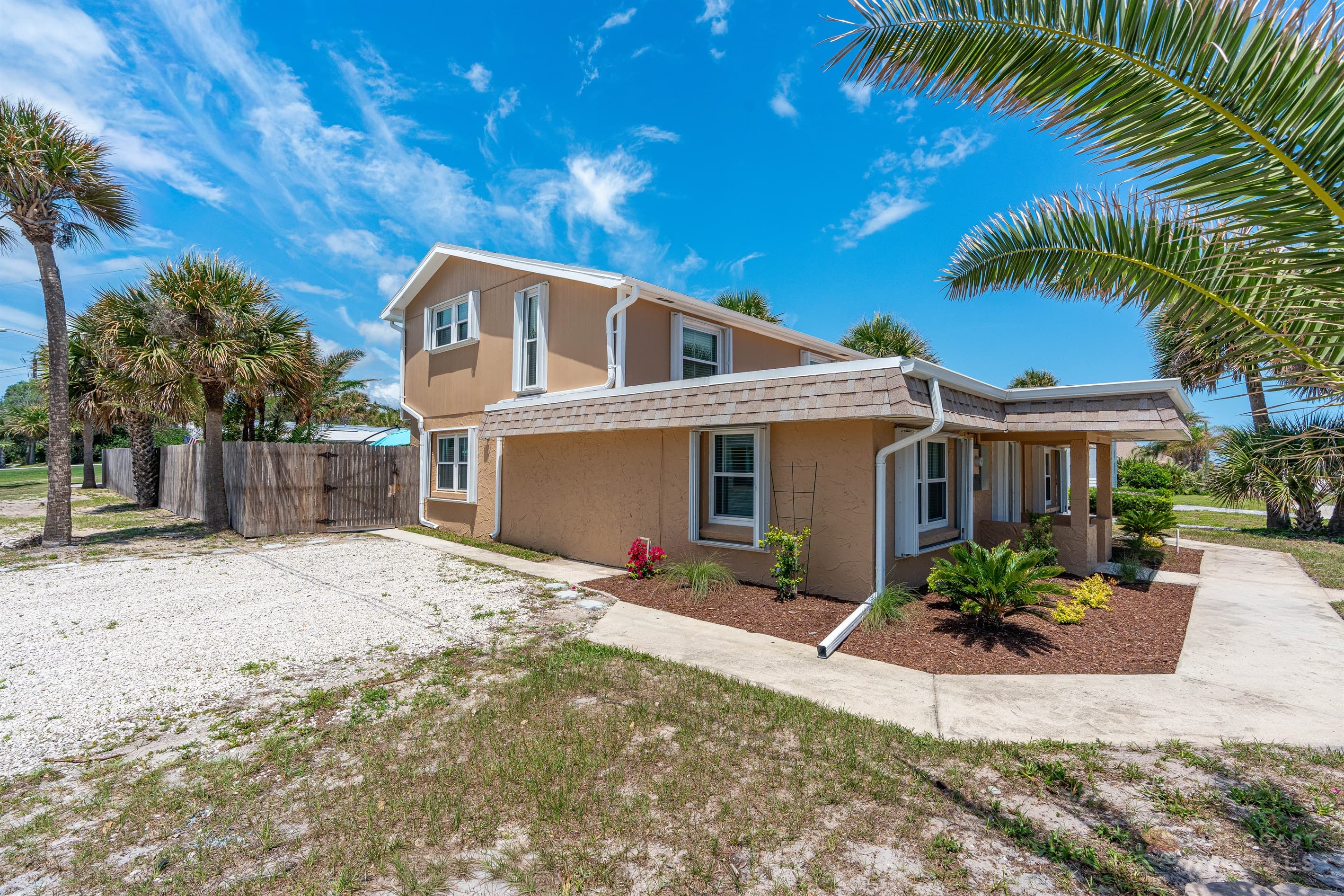 Lovely beachside home located right on A1A and STEPS from the beach!
