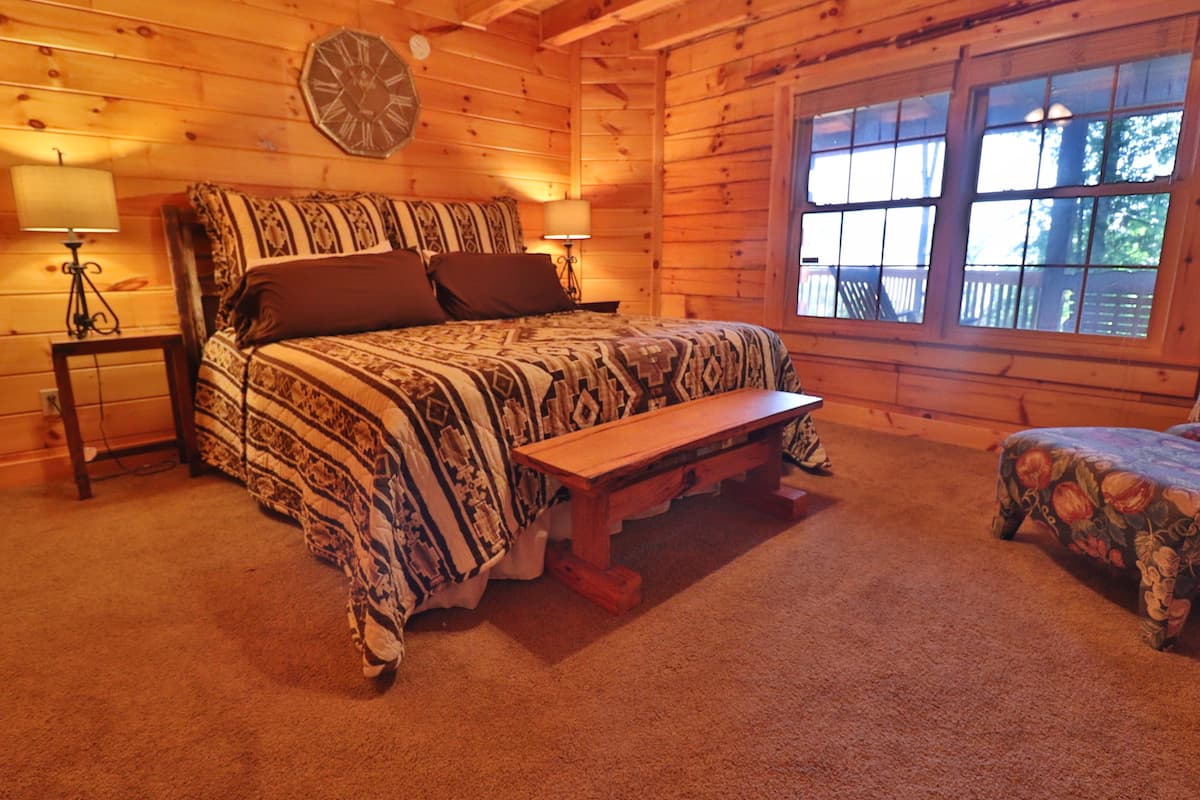King bedroom (1 of 2) with mountain view. 