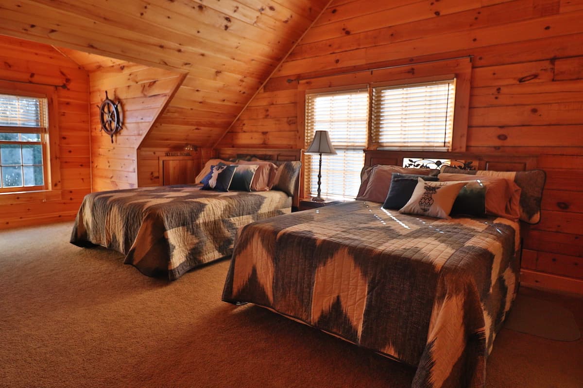 Spacious dual queen bedroom (1 of 2). 