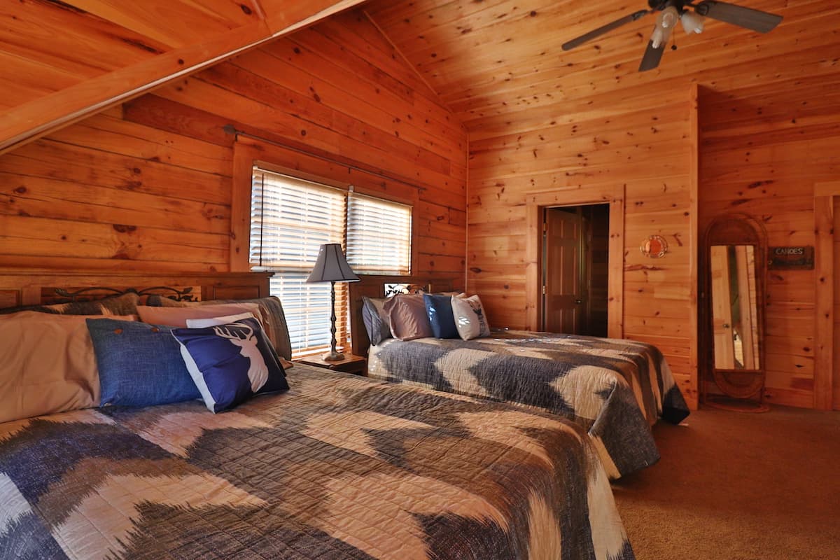 Spacious dual queen bedroom (1 of 2). 