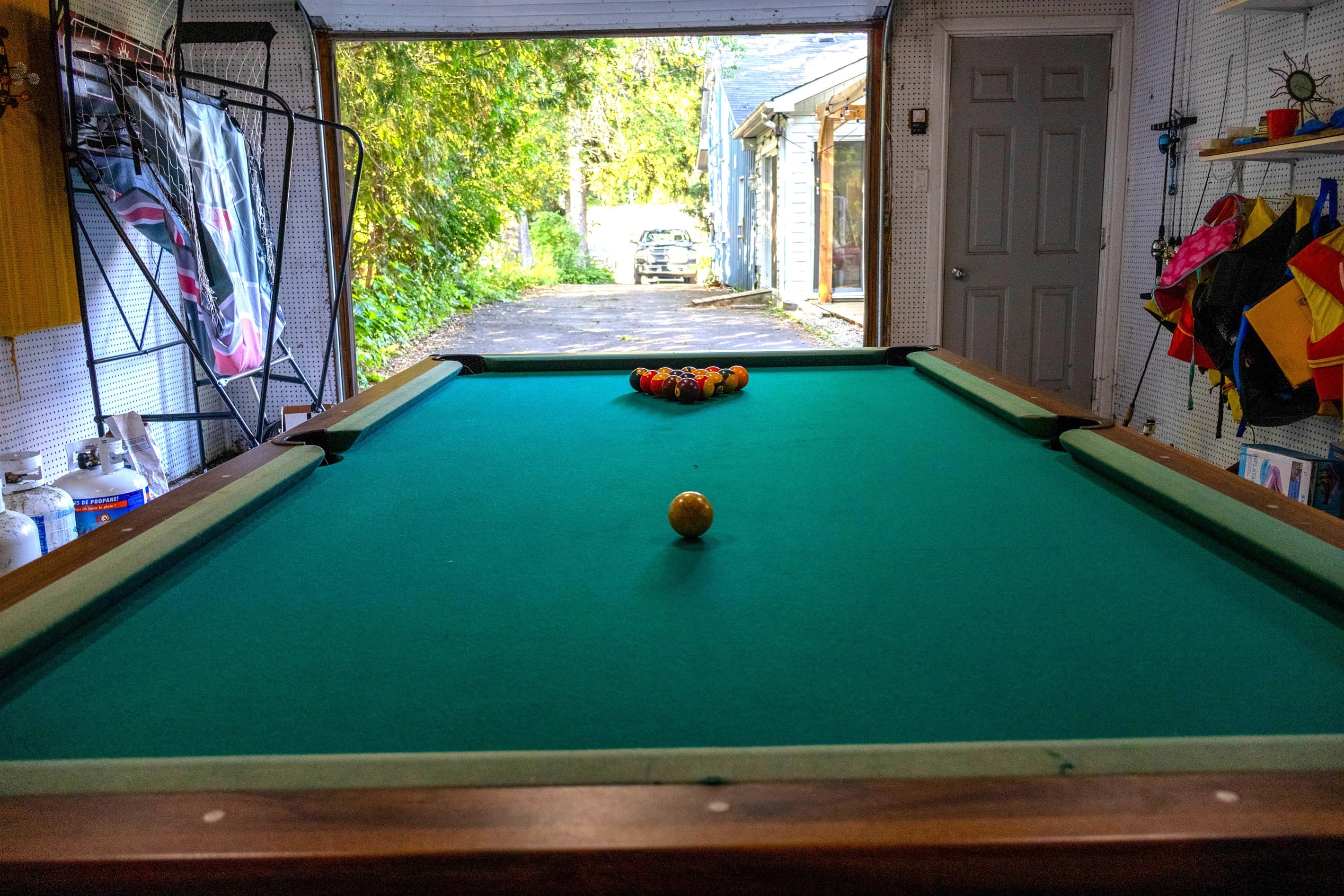 Game Room: Darts, Pool, Basketball Shooter, life jackets, outdoor games (badminton, Boche ball, lawn darts, cornhole, croquet, and more!). Not Temperature Controlled. 