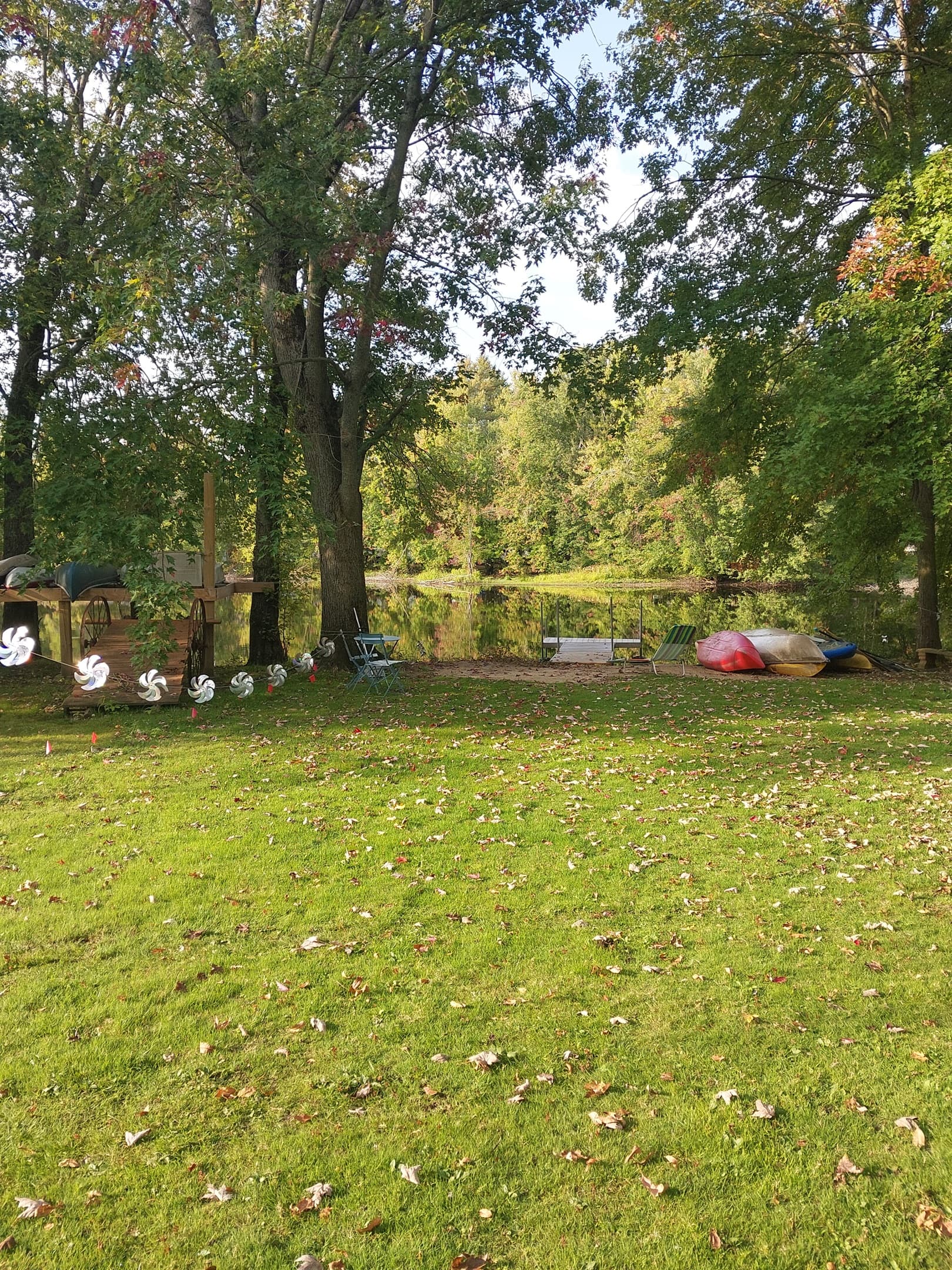 A large, open yard filled with green space, perfect for quiet moments or lively fun.