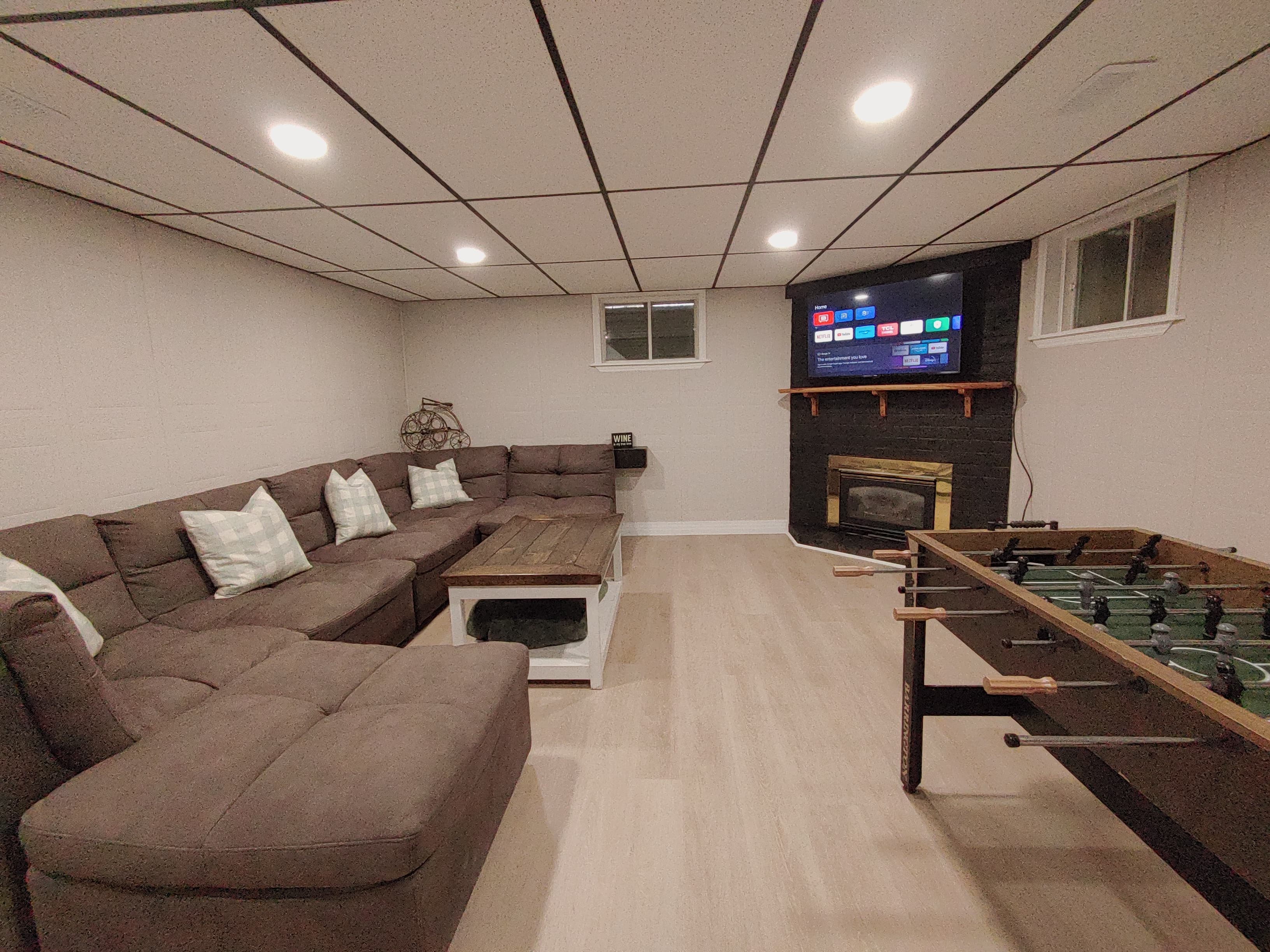 Your indoor play hub: TV, sound bar, foosball, gas fireplace and over 50 board games for endless laughs and friendly competition.