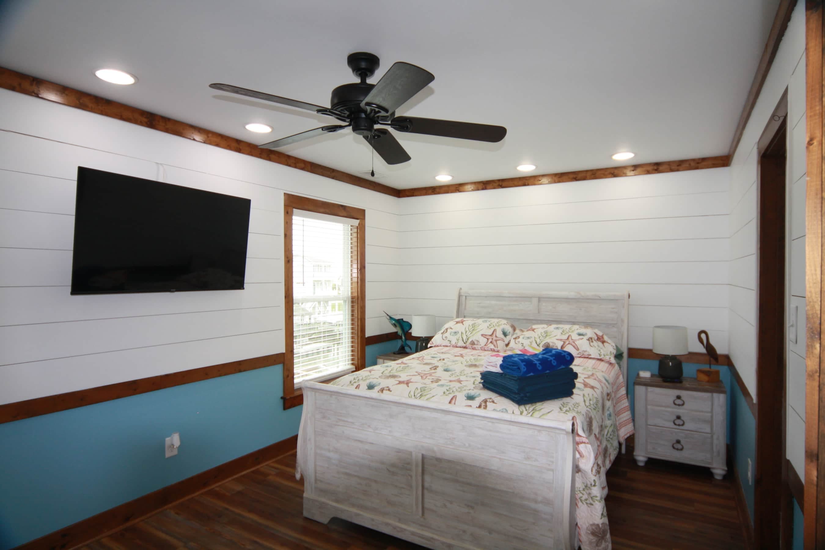 2nd Bedroom- Queen with private balcony and Smart TV