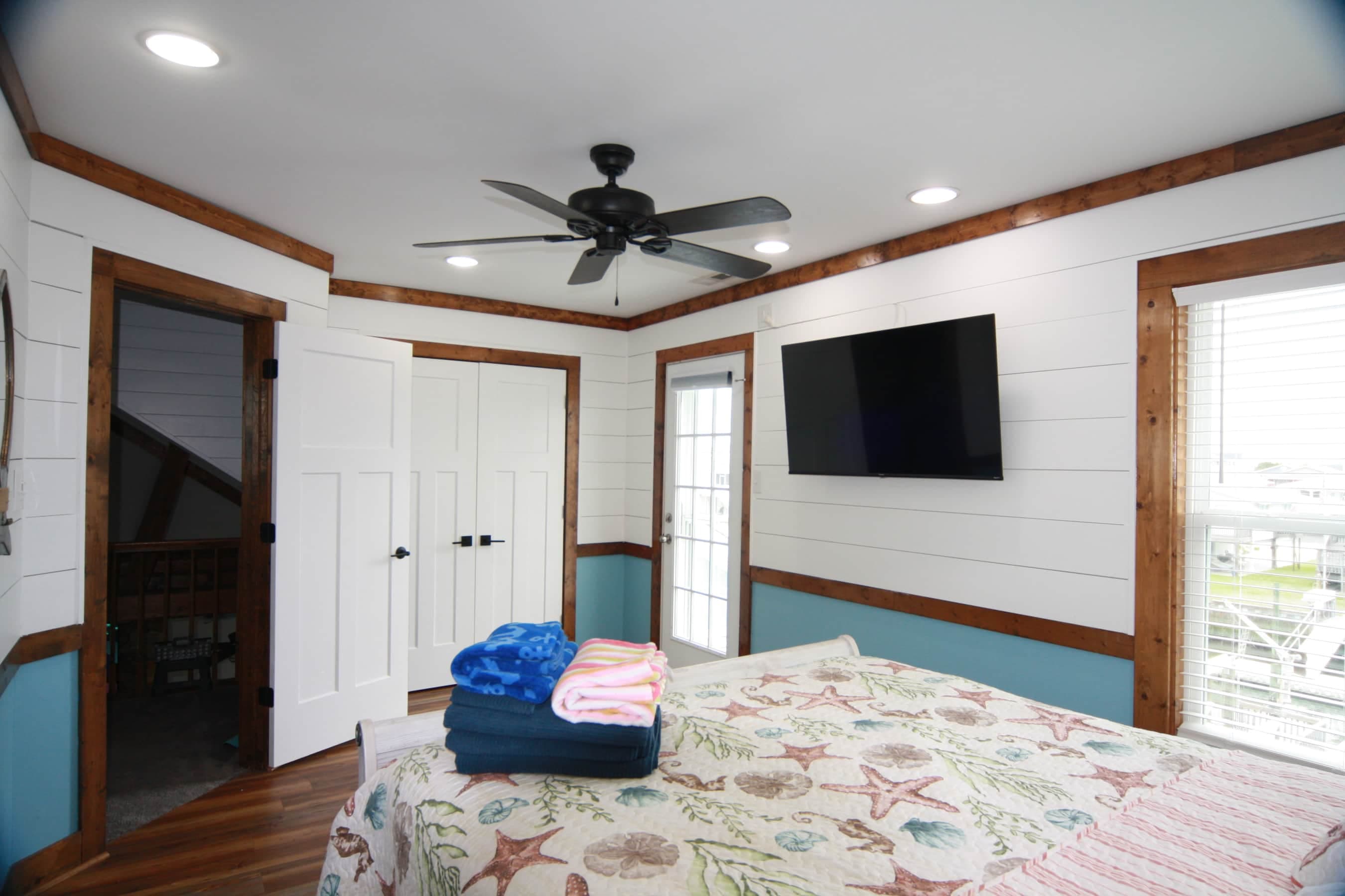 2nd Bedroom- Queen with private balcony and Smart TV