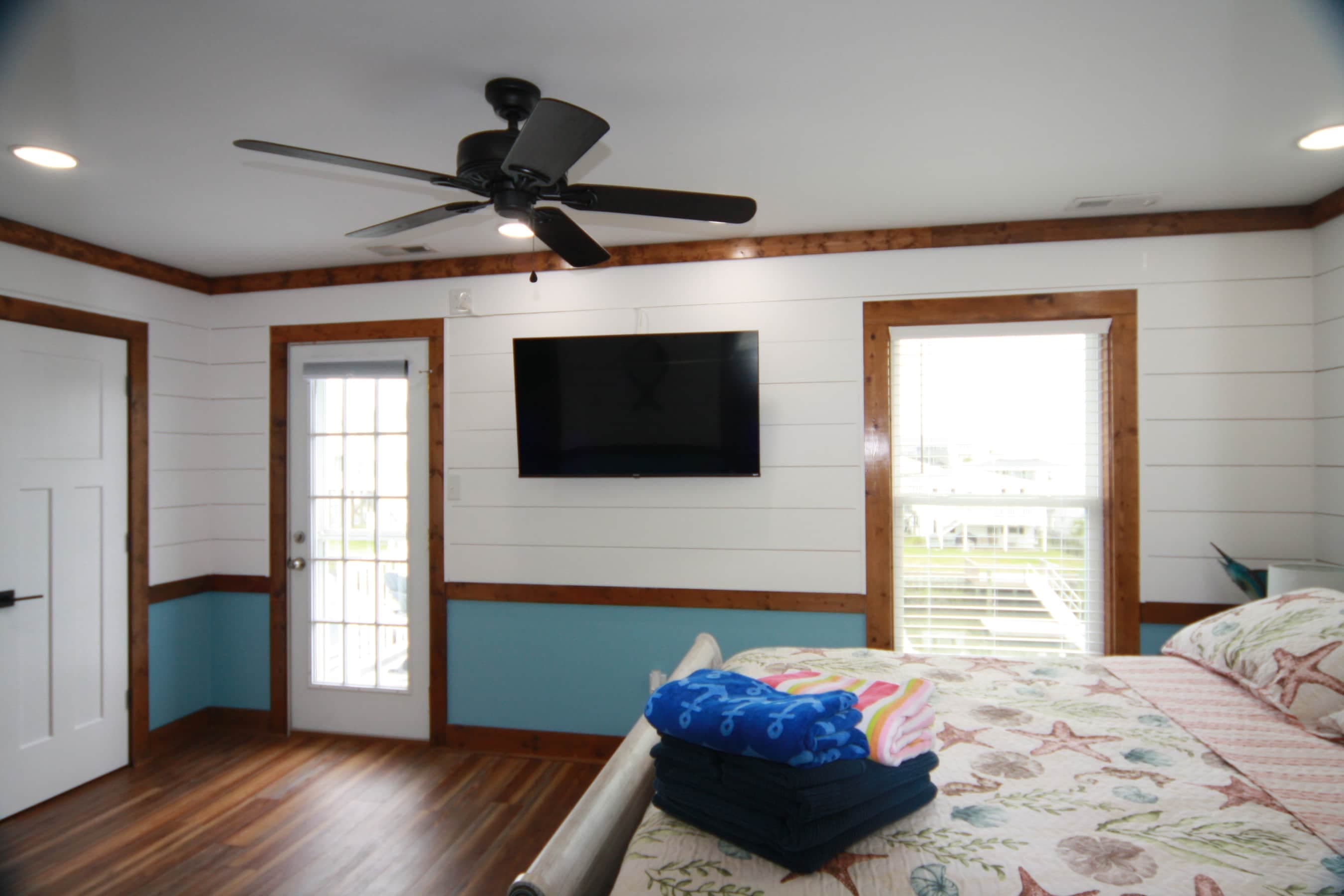 2nd Bedroom- Queen with private balcony and Smart TV