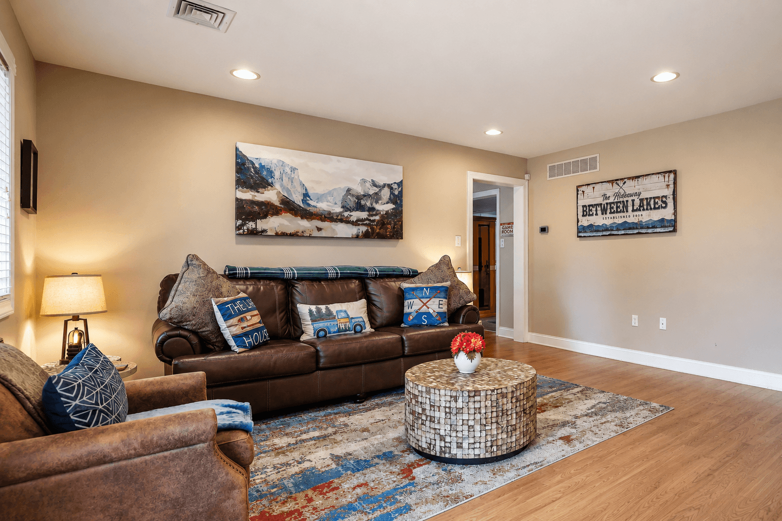 A welcoming 1st floor living room (foyer) with comfortable seating and a queen-size sofa sleeper, offering extra sleeping space for larger groups.