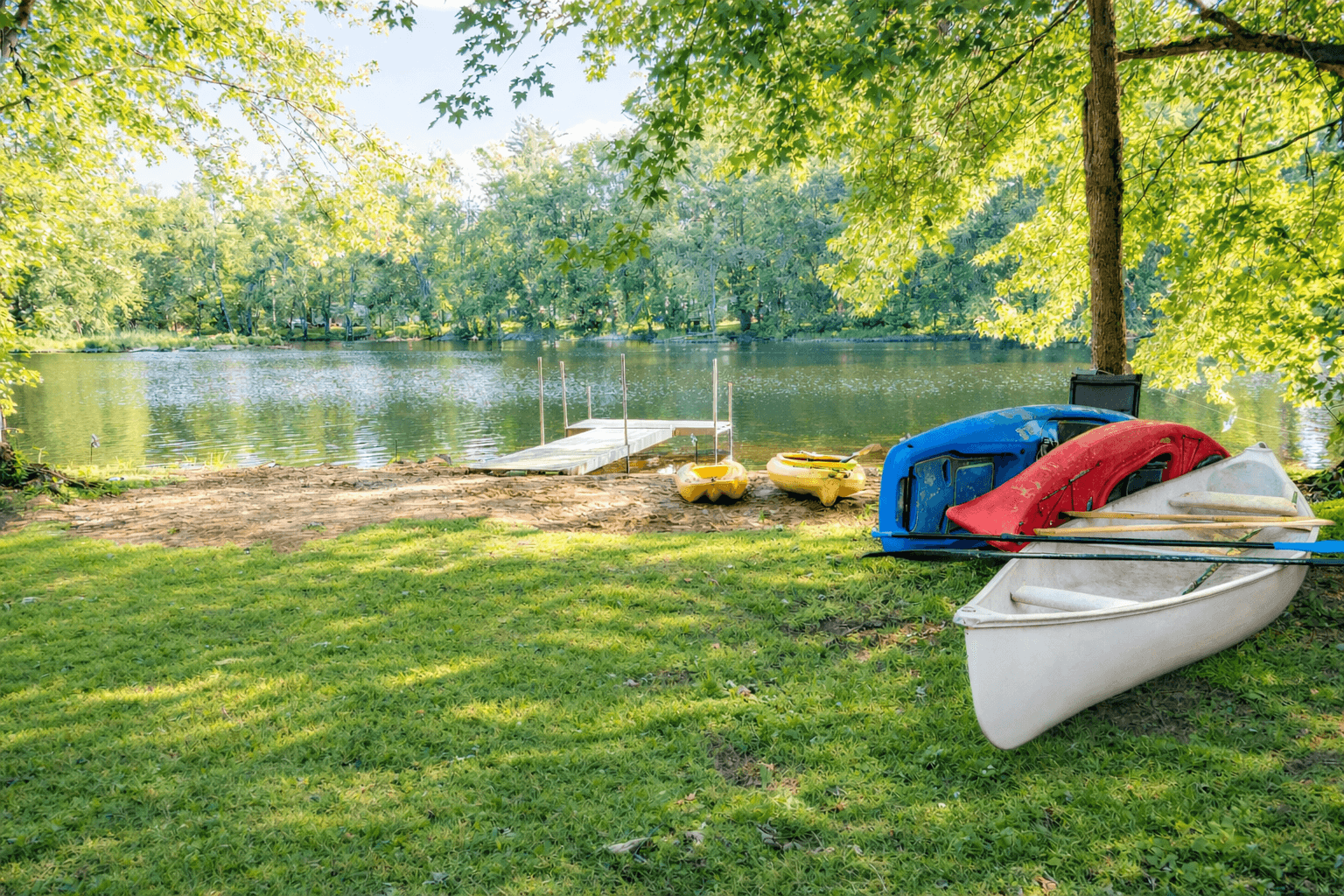 Our private beach with kayaks, canoe, paddleboards, and space to slow down. Unlike the busy, high-traffic lakes, the river offers a calmer place to paddle. Beach installed end of June until the first frost. 