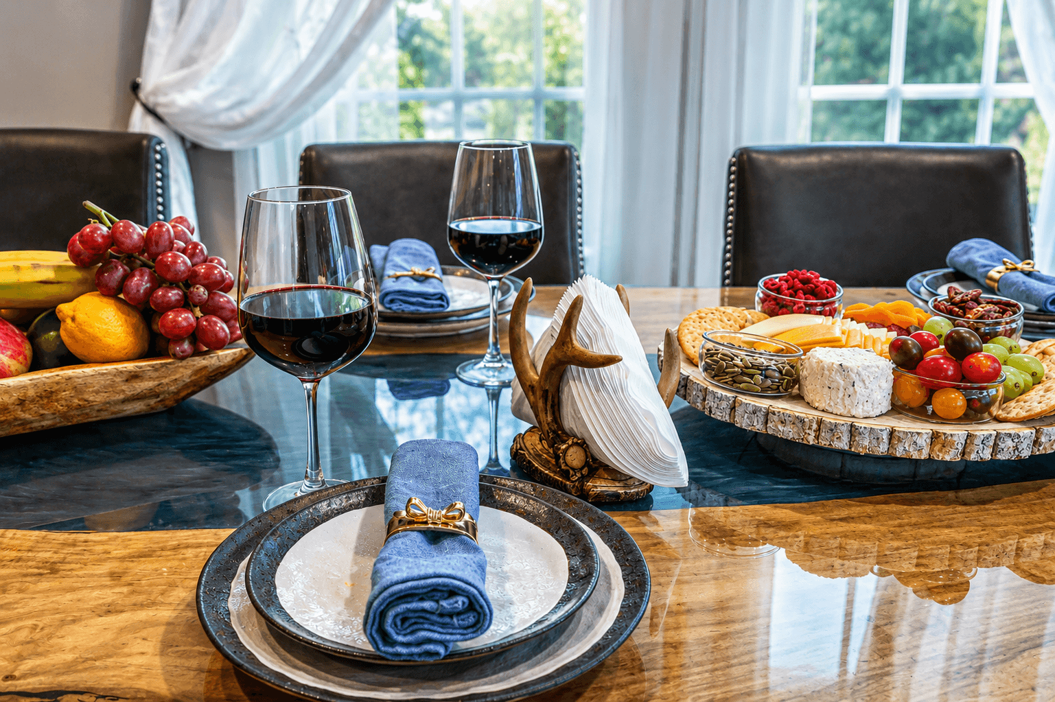 Set the scene for a cozy dining experience with this beautifully staged table, complete with wine and a delightful charcuterie spread. (Please note: food and wine are for staging purposes only and are not provided.)