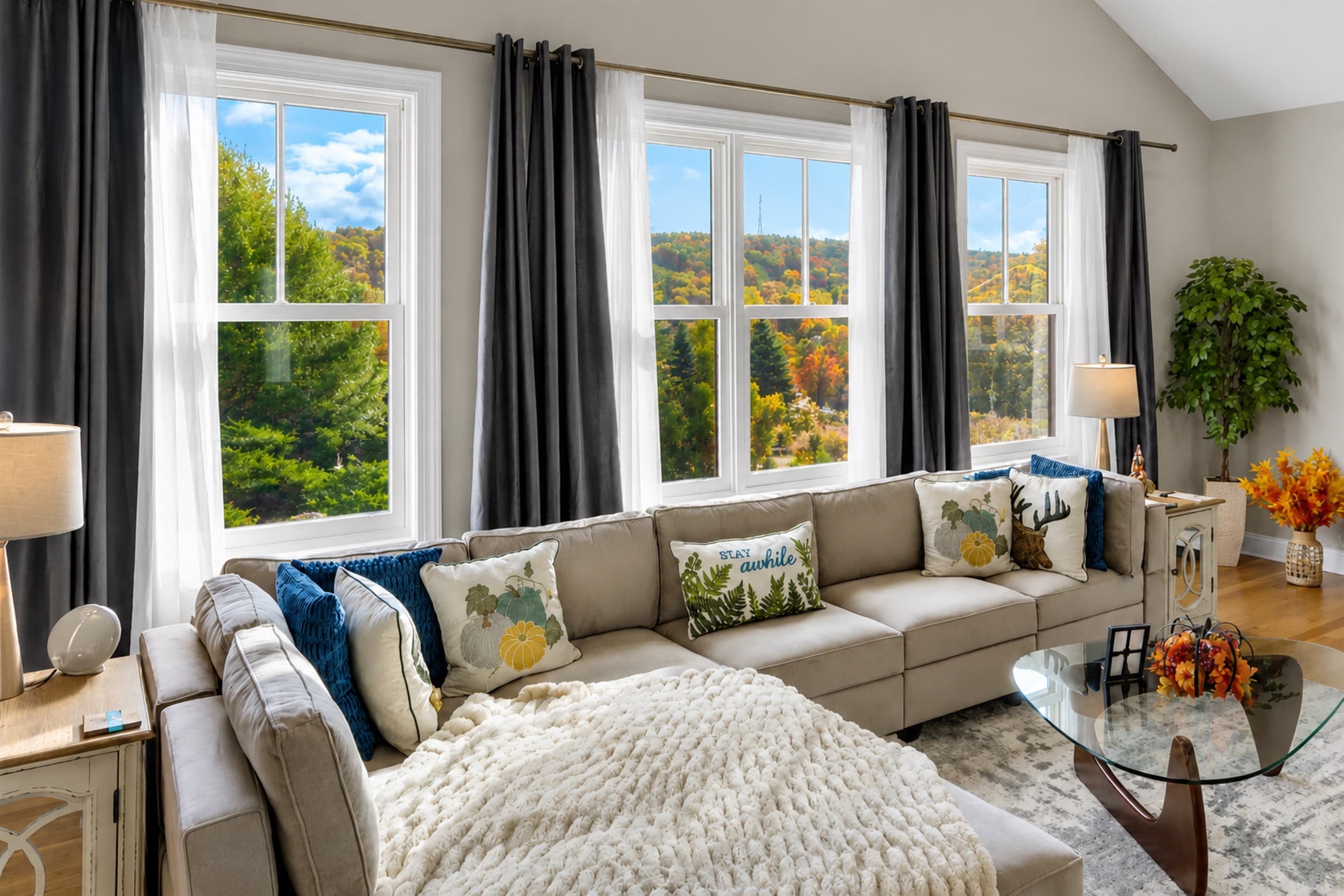 The best seat in the house comes with a mountain view. Gather, unwind, and enjoy the beauty of every season from the comfort of your living room.