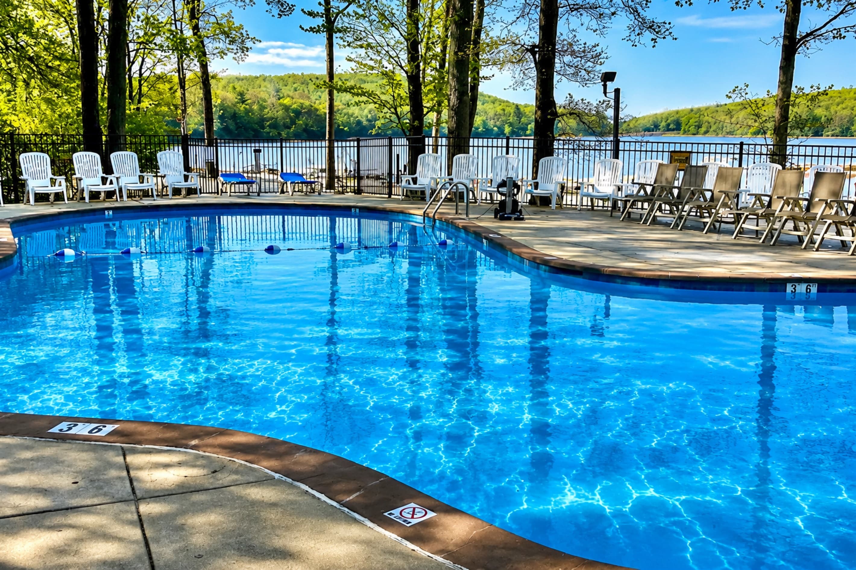 Dive into relaxation at Private Big Boulder! Enjoy FREE access to our serene, seasonal outdoor swimming pools—perfectly heated for those cooler mountain days. Soak in the peaceful lake views, unwind under the trees, and let your getaway begin.