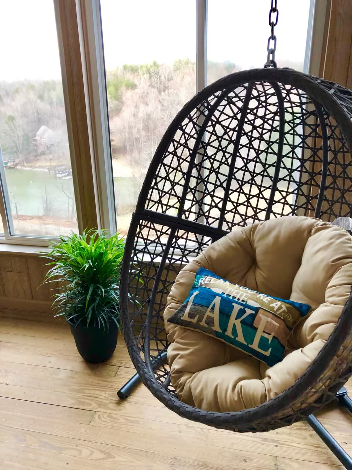Swing into lake life — hanging egg chair with direct dock and water views.
dock view, Smith Mountain Lake, relaxation nook, Instagram-worthy, reading nook, spa vibe.