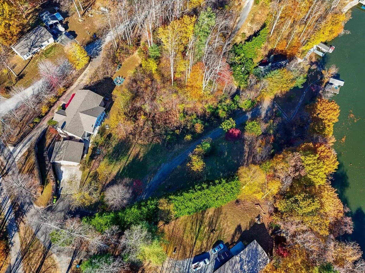 Aerial view of the lakefront lot — fall foliage & private Smith Mountain Lake access.

lakefront, Smith Mountain Lake, SML, private dock, waterfront, fall foliage, Goodview VA, aerial view, lakefront lot, direct water access.