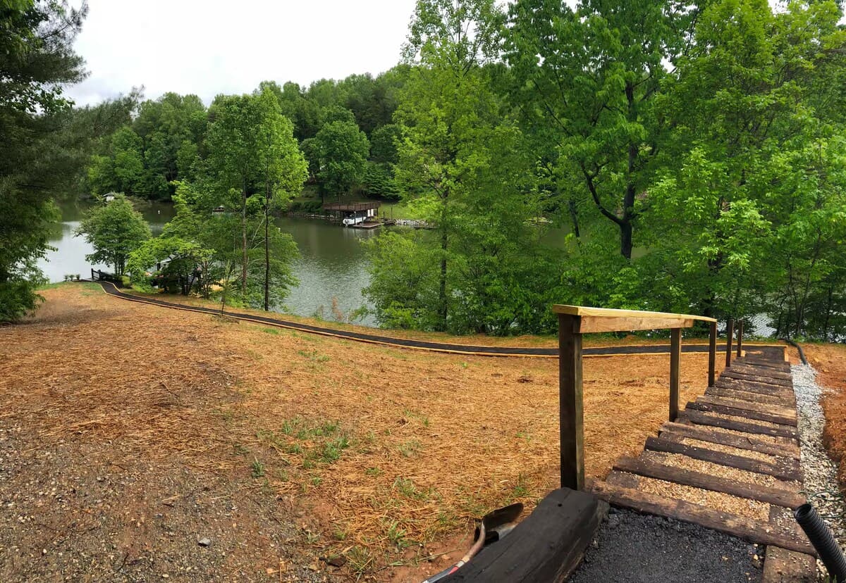 Private path & wood staircase down to the PRIVATE dock and lake.

private dock, lake access, lakefront, Smith Mountain Lake, waterfront path, dock stairs, shoreline, SML, direct water access, walk to dock.