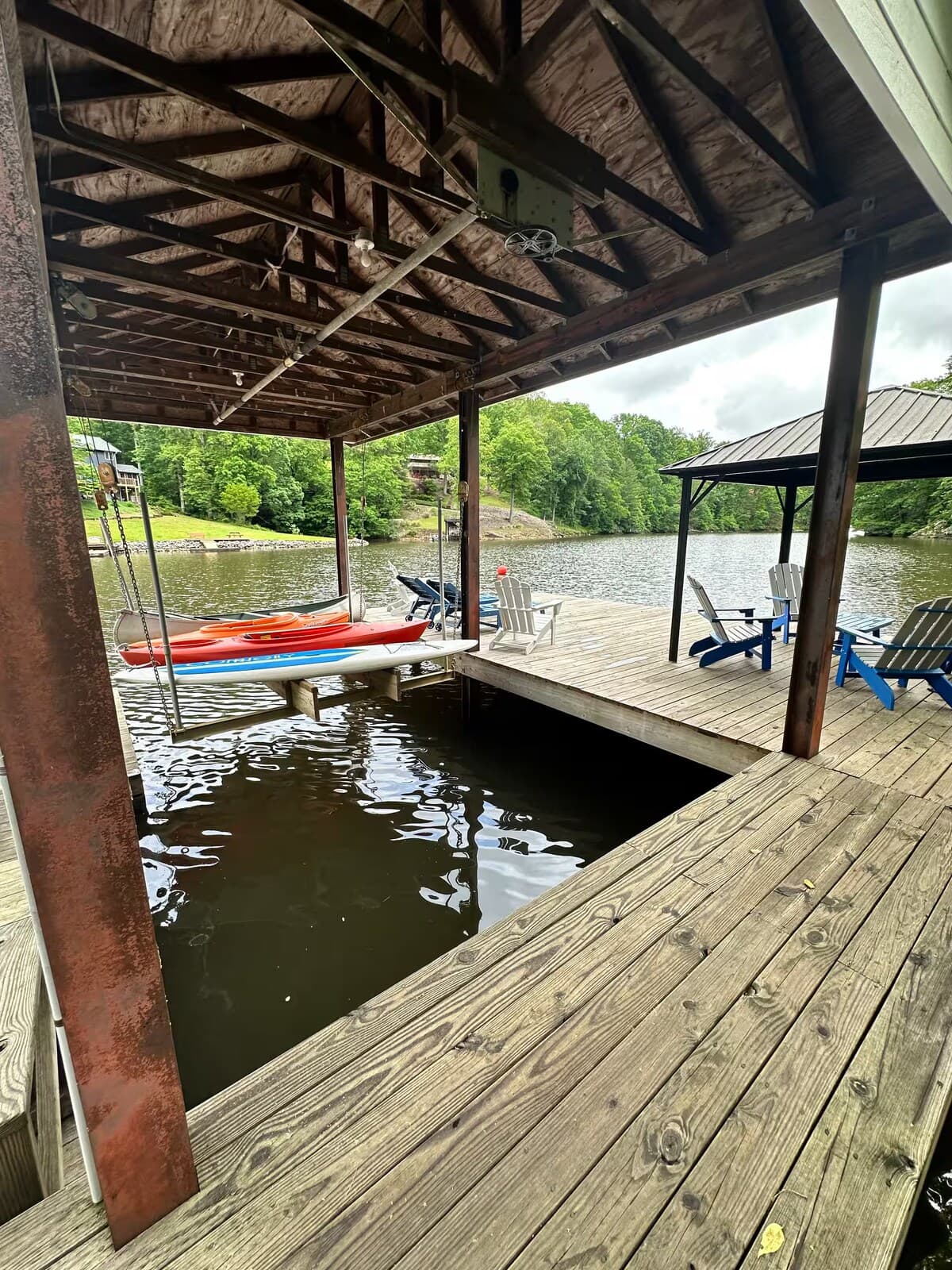 Covered pergola dock with kayak storage — bring your own boat and tie off.

No boat lift — but bring your own boat and tie off securely to the private dock.