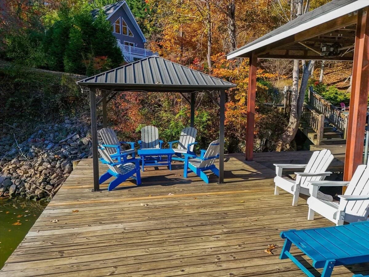 Stroll down the private drive to your covered-pergola dock and lakeside chairs.

private dock, private drive, secluded dock, covered pergola, lakeside chairs, Adirondack, peaceful cove, Smith Mountain Lake, SML lakefront.