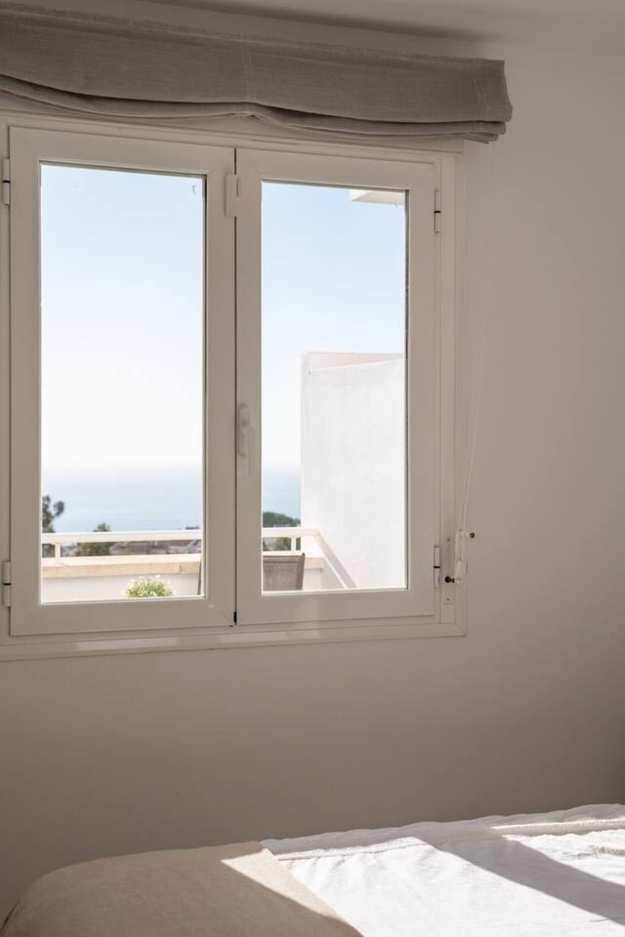 Even from the bedroom, you can enjoy the beautiful sea view and feel the bright, natural light streaming in.