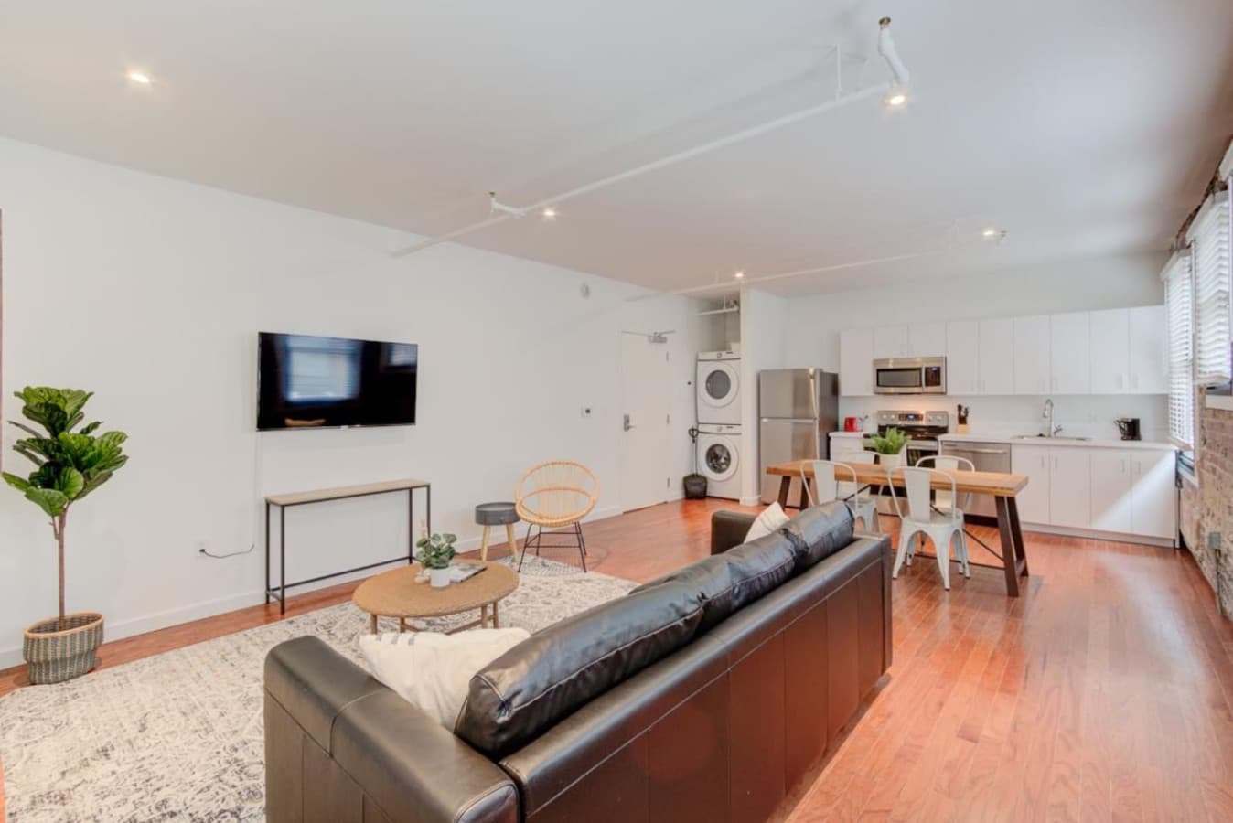The apartment has a spacious living area.  A comfy sitting spot.  A table to enjoy a tasty meal, have a coffee, or get some work done. Reap the daily benefits of natural light and enjoy the “sunshine vitamin”.