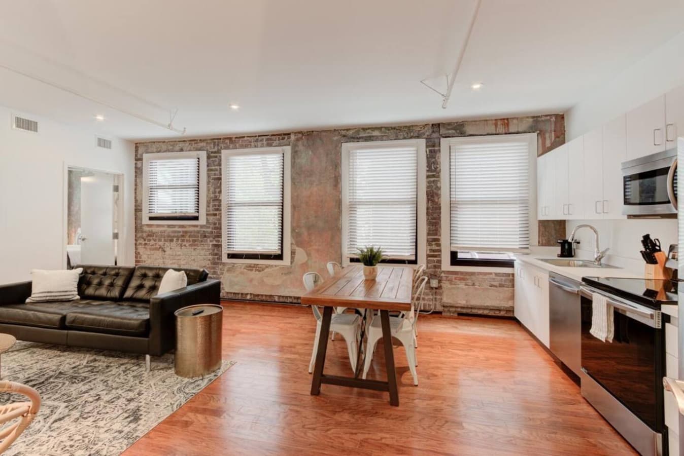 There are blinds in every window. You have full control over the amount of natural light that comes in.
