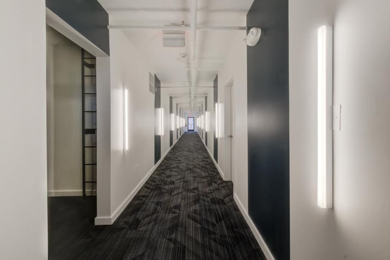 For easy access to your apartment, we have a spotless and well-lit hallway.