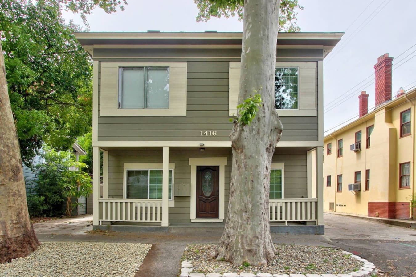Inviting entrance to a fully renovated historic home.