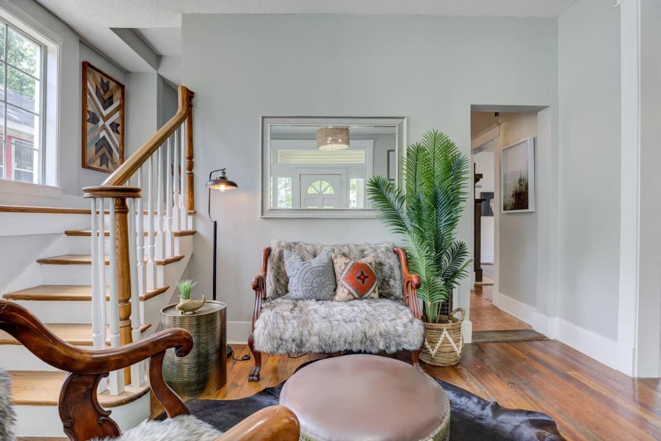 First impressions matter—relax in this inviting entry sitting area.