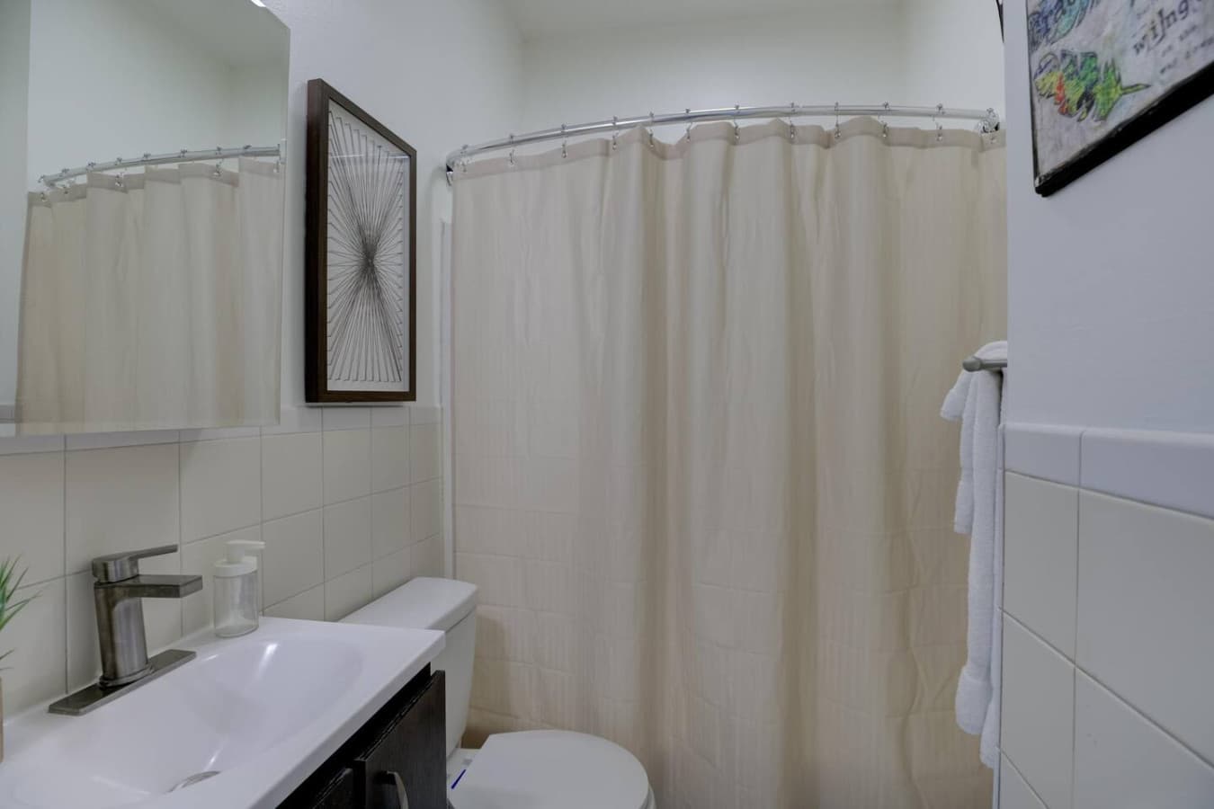 Refresh and recharge—full bathroom stocked with toiletries.