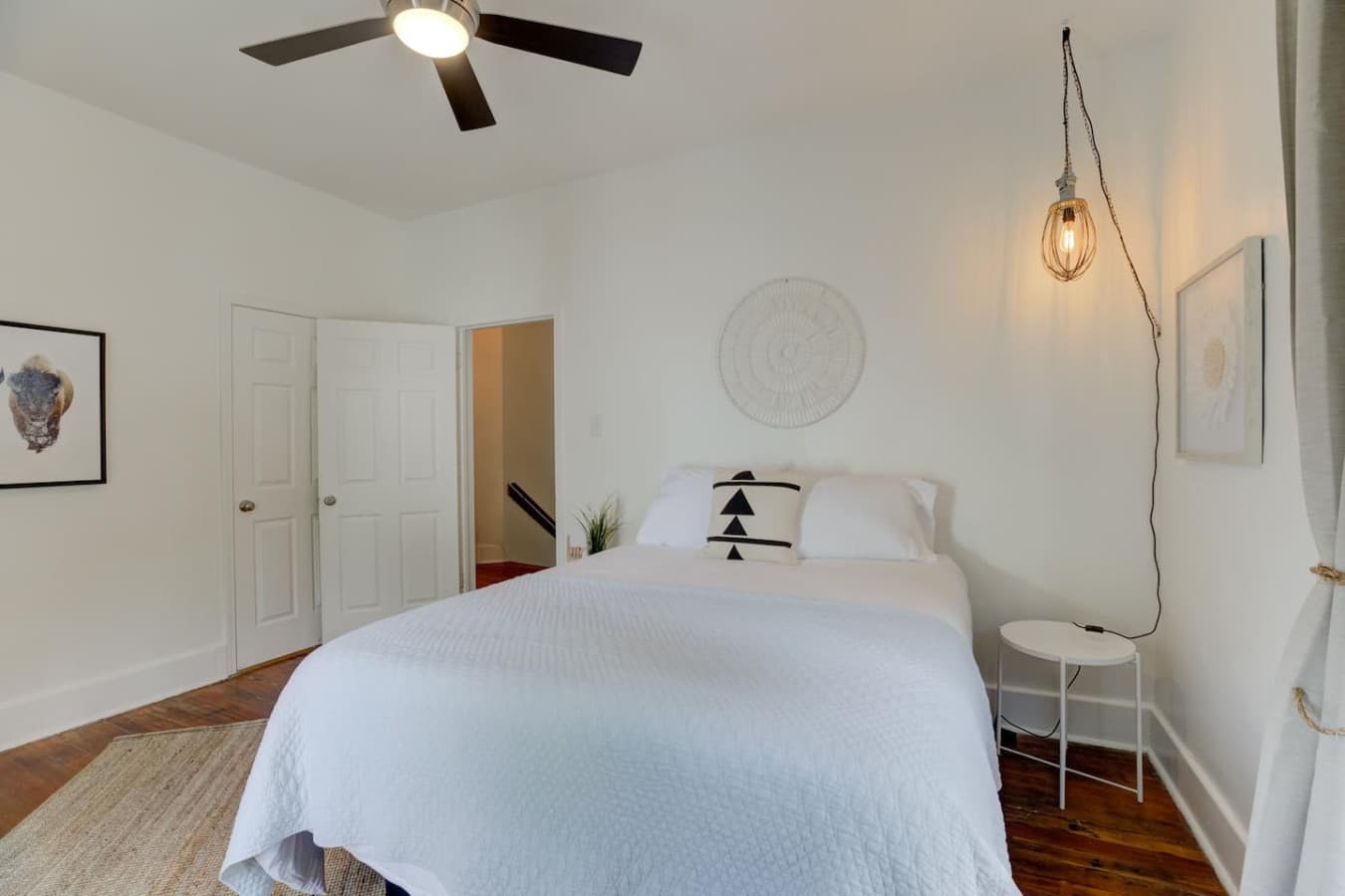 Drift off in this light and lovely queen bed.